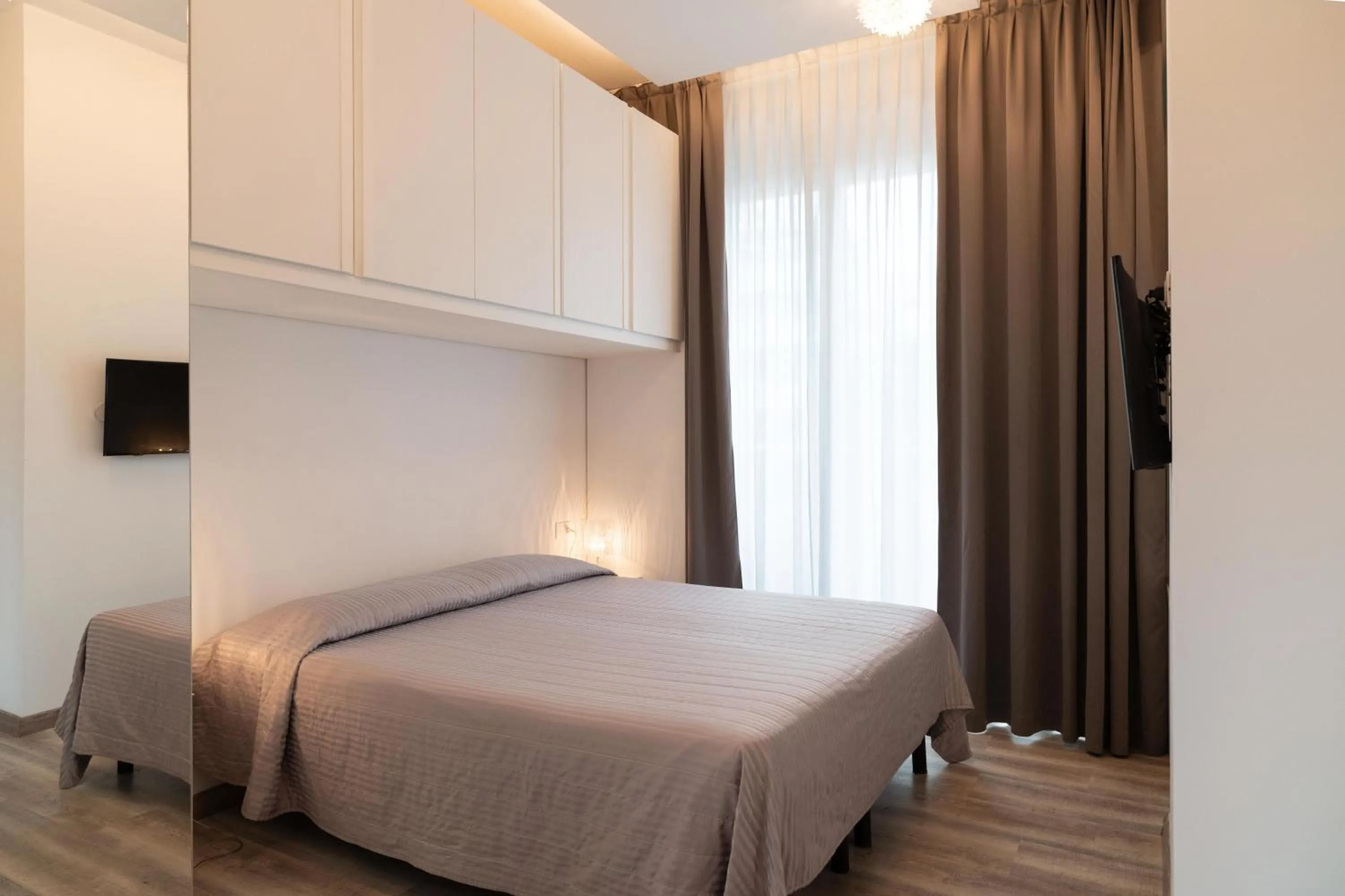 Bedroom, Bed in Perla Verde Hotel