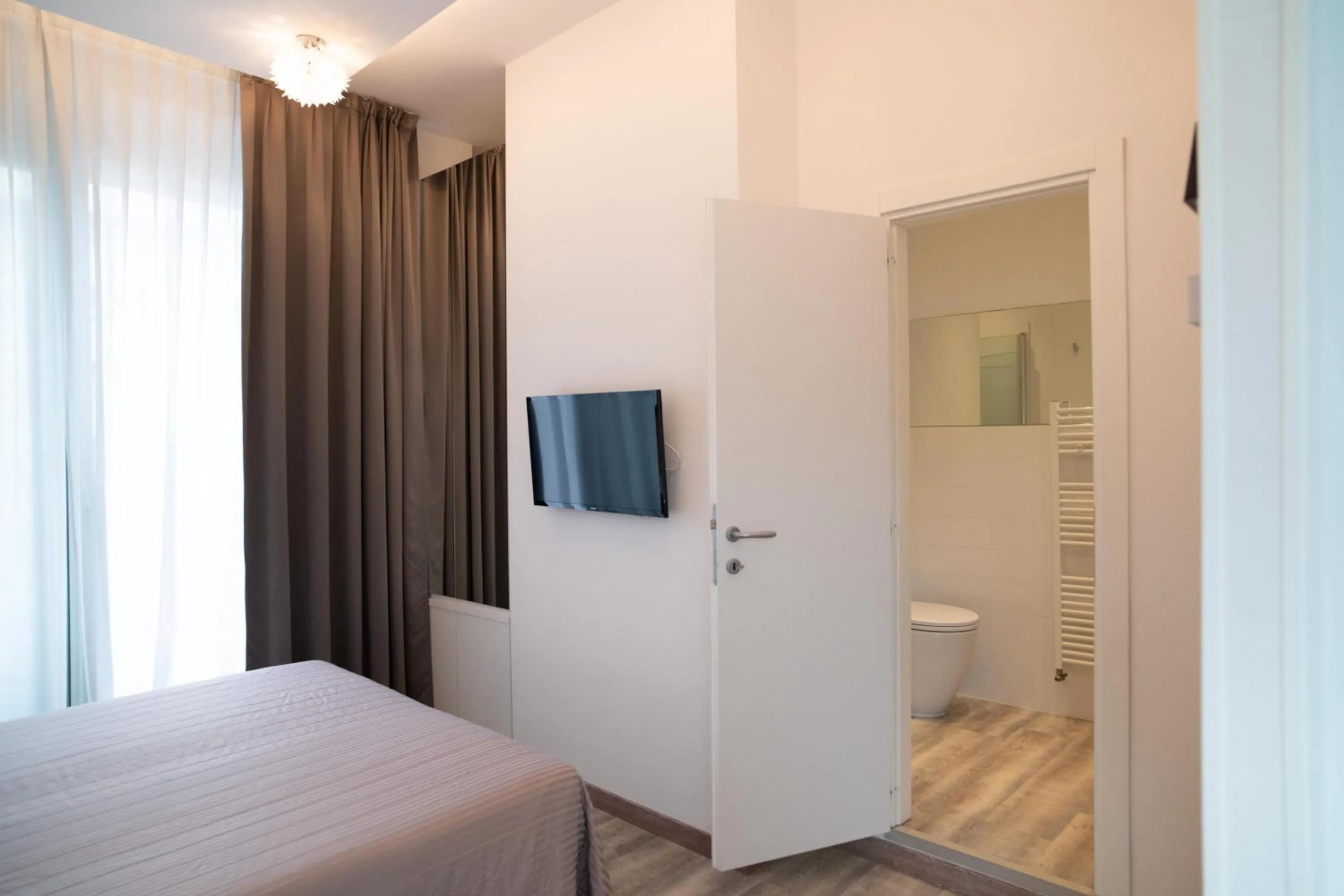 Photo of the whole room, Bed in Perla Verde Hotel