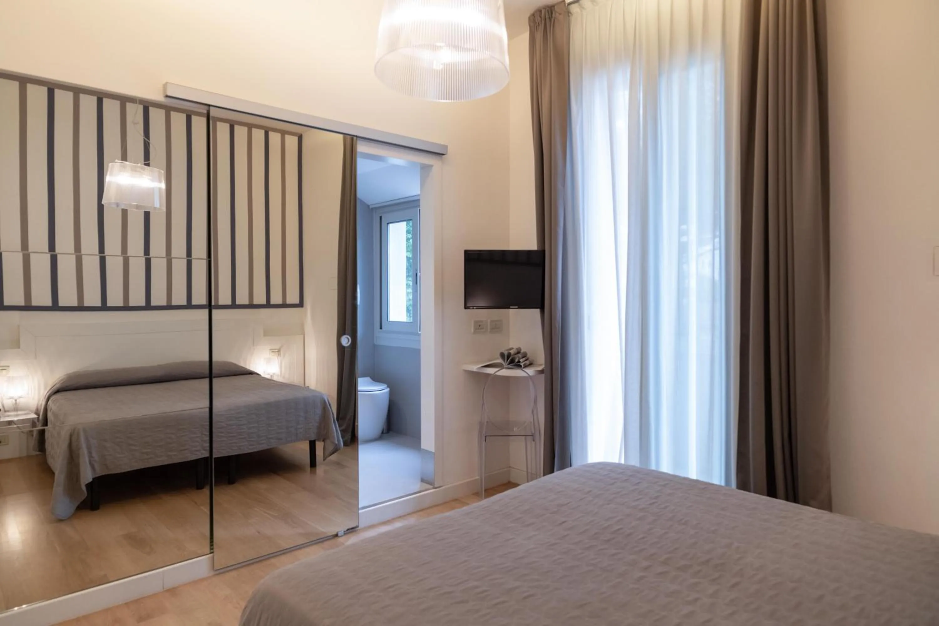 Photo of the whole room, Bed in Perla Verde Hotel