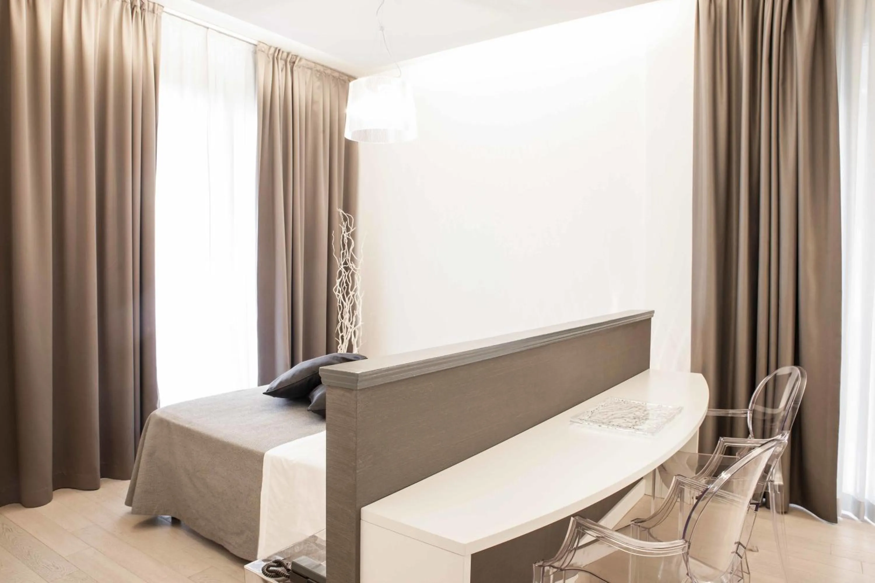 Bed in Perla Verde Hotel