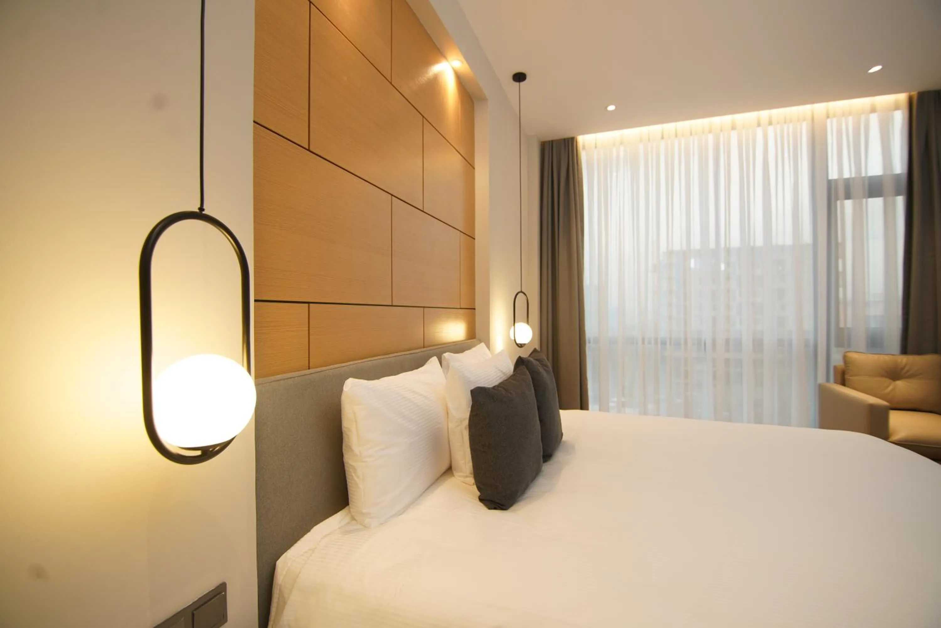 Bed in Loft Hotel Apartment