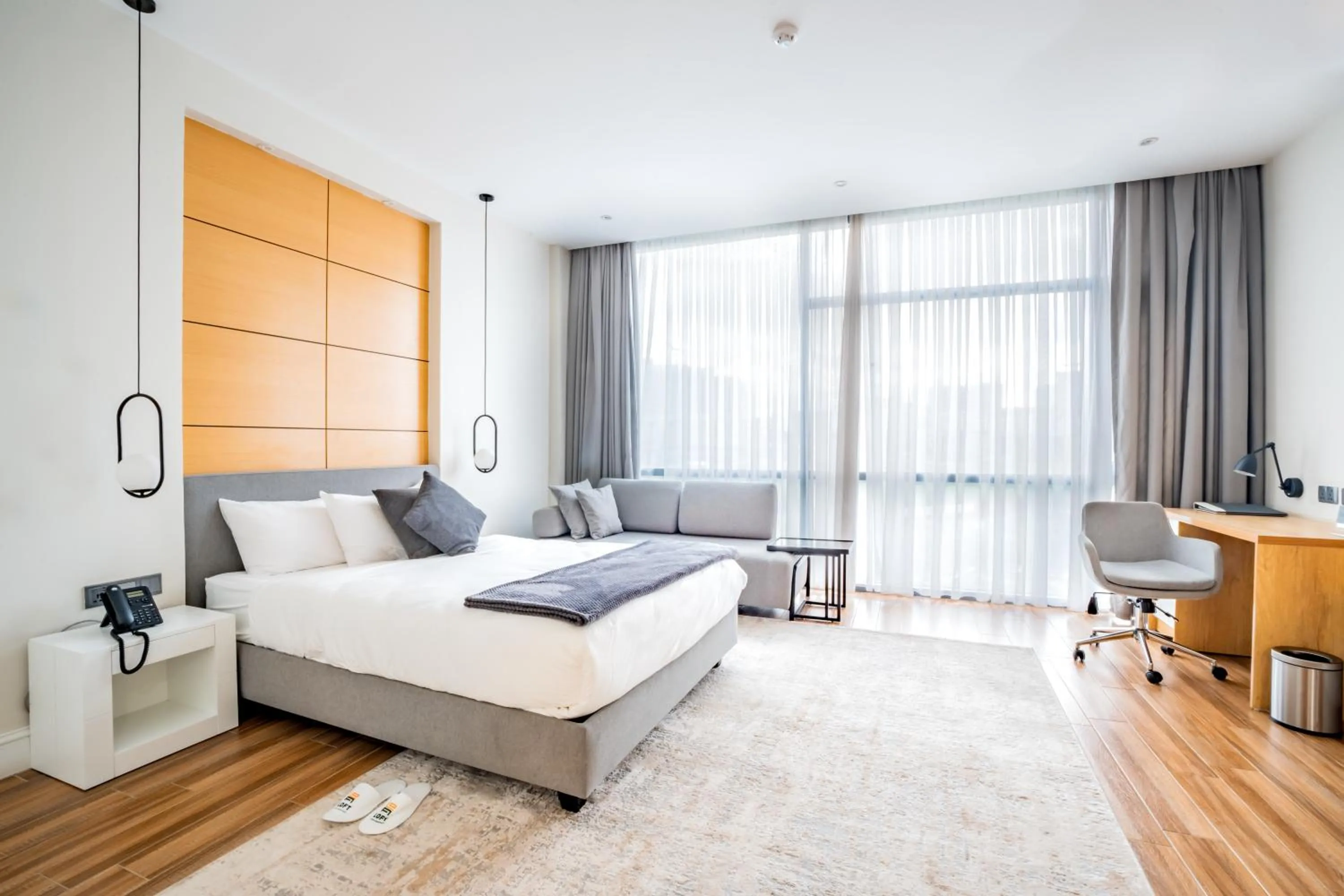 Bed in Loft Hotel Apartment