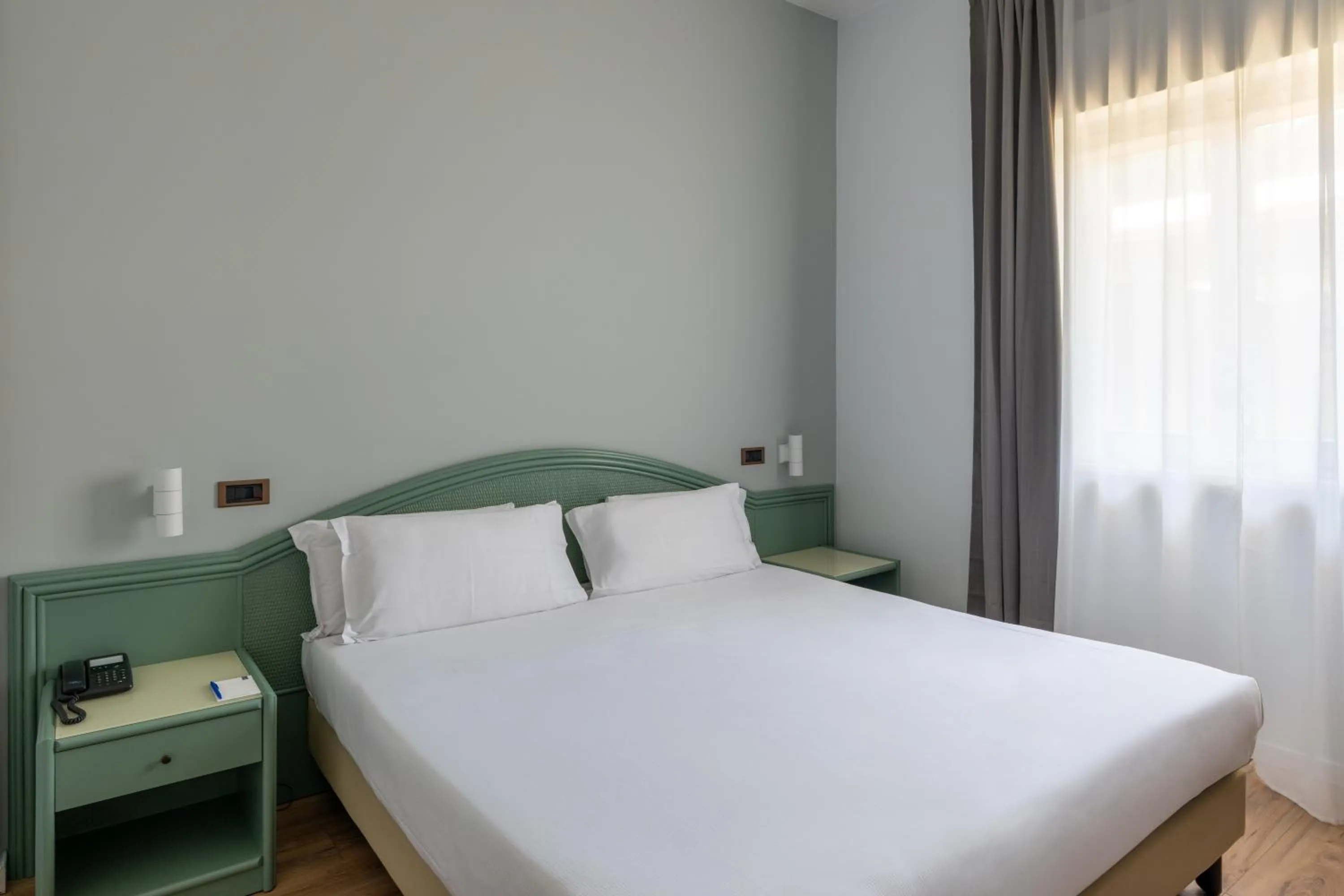 Bed in Hotel Riva Del Sole