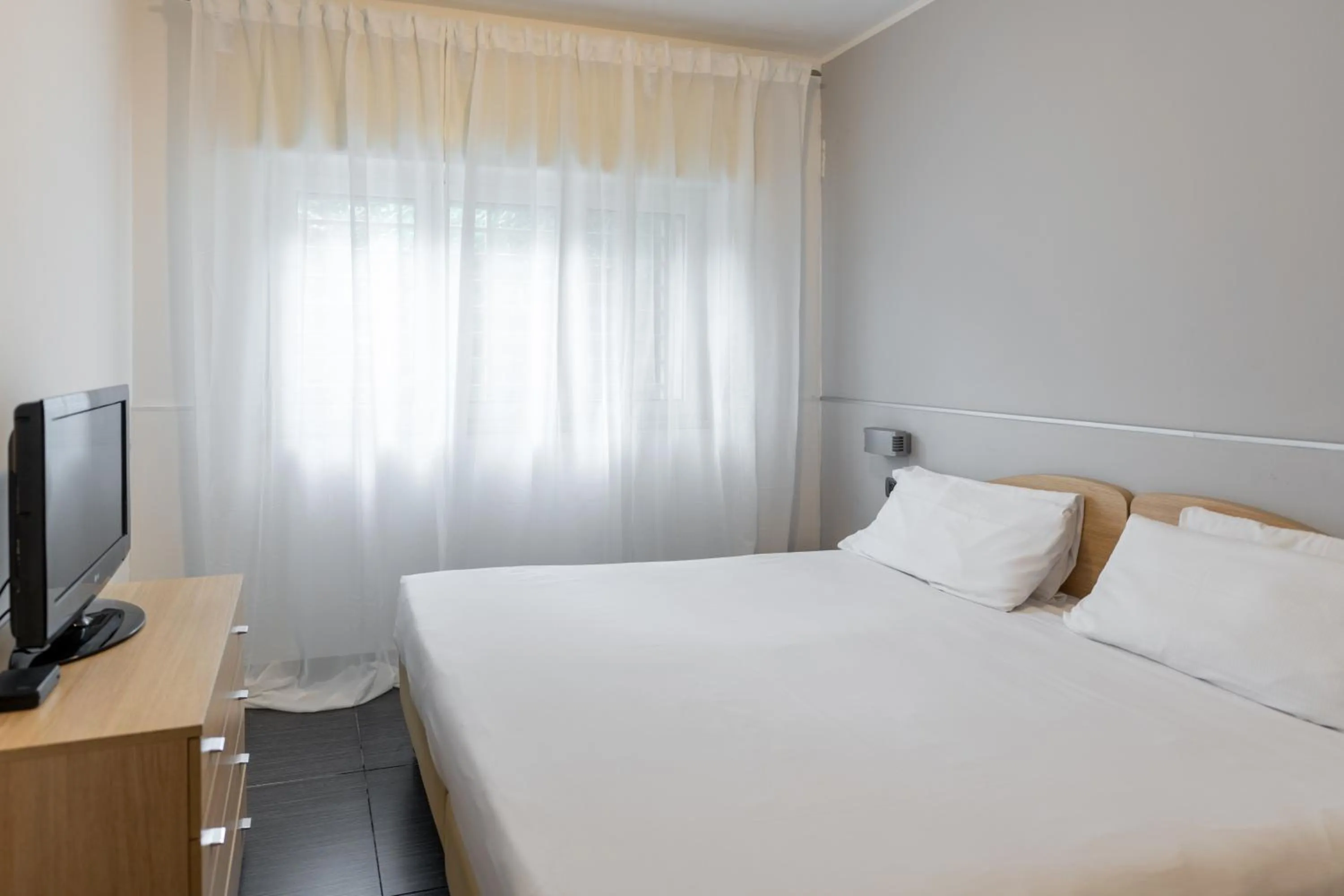 Bed in Hotel Riva Del Sole