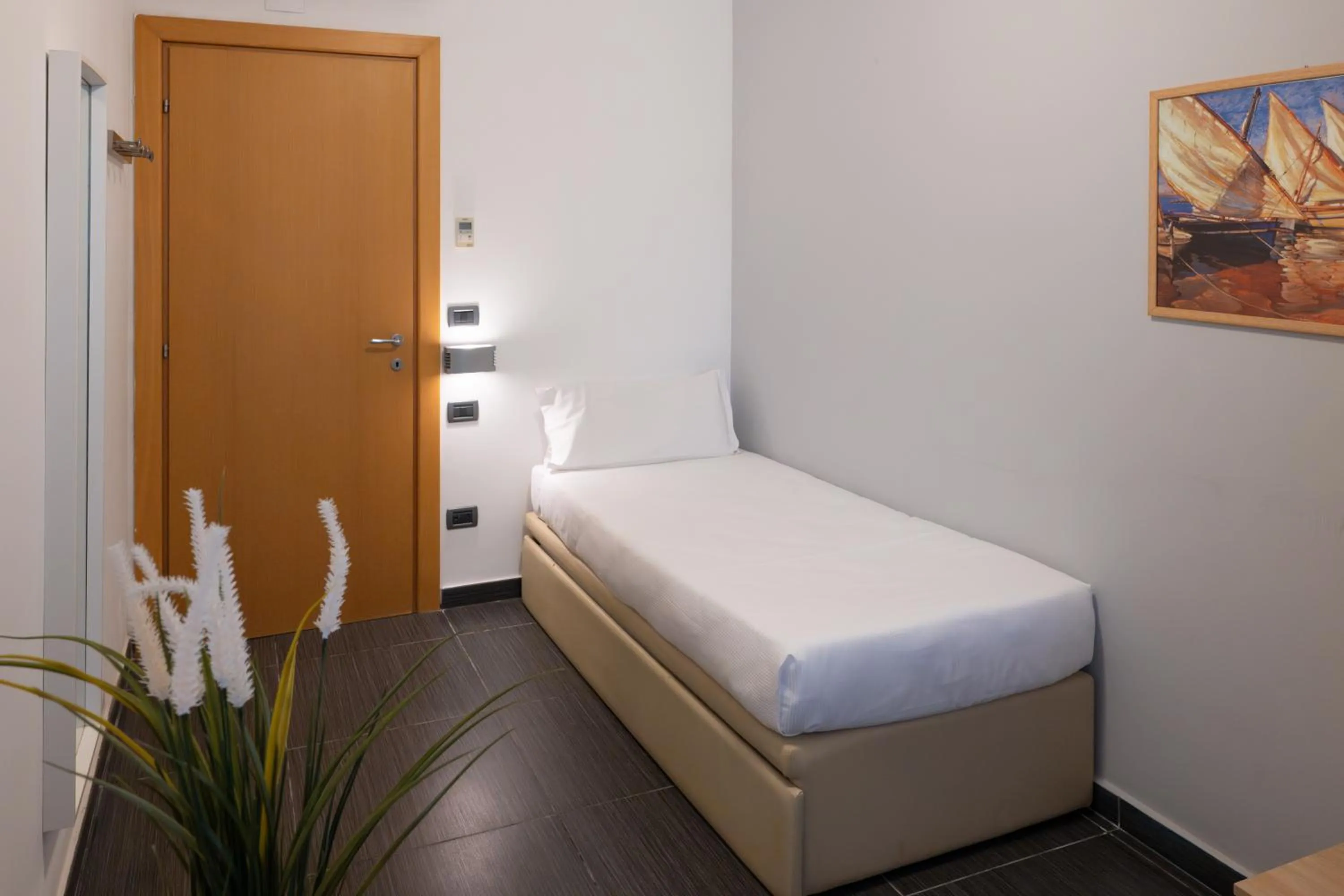 Bed in Hotel Riva Del Sole