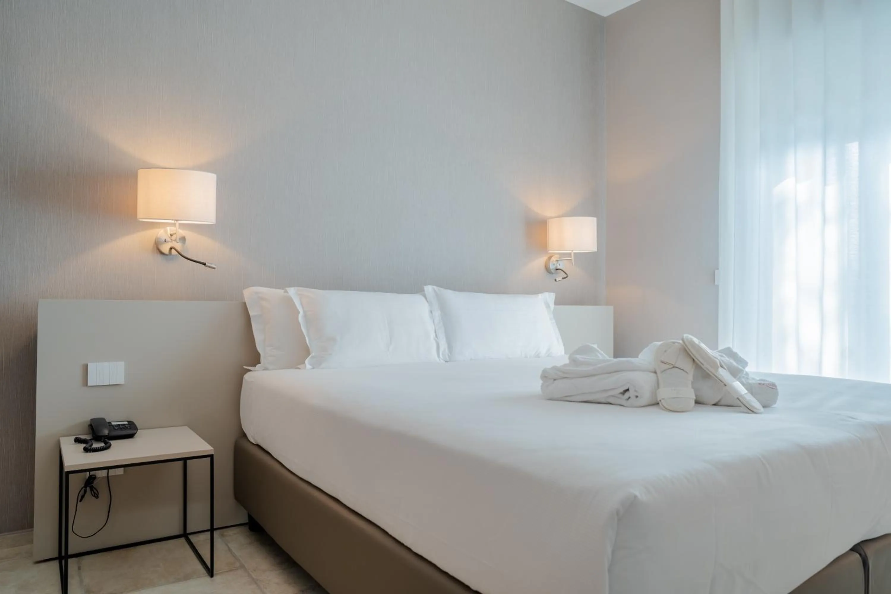 Bed in Hotel Riva Del Sole