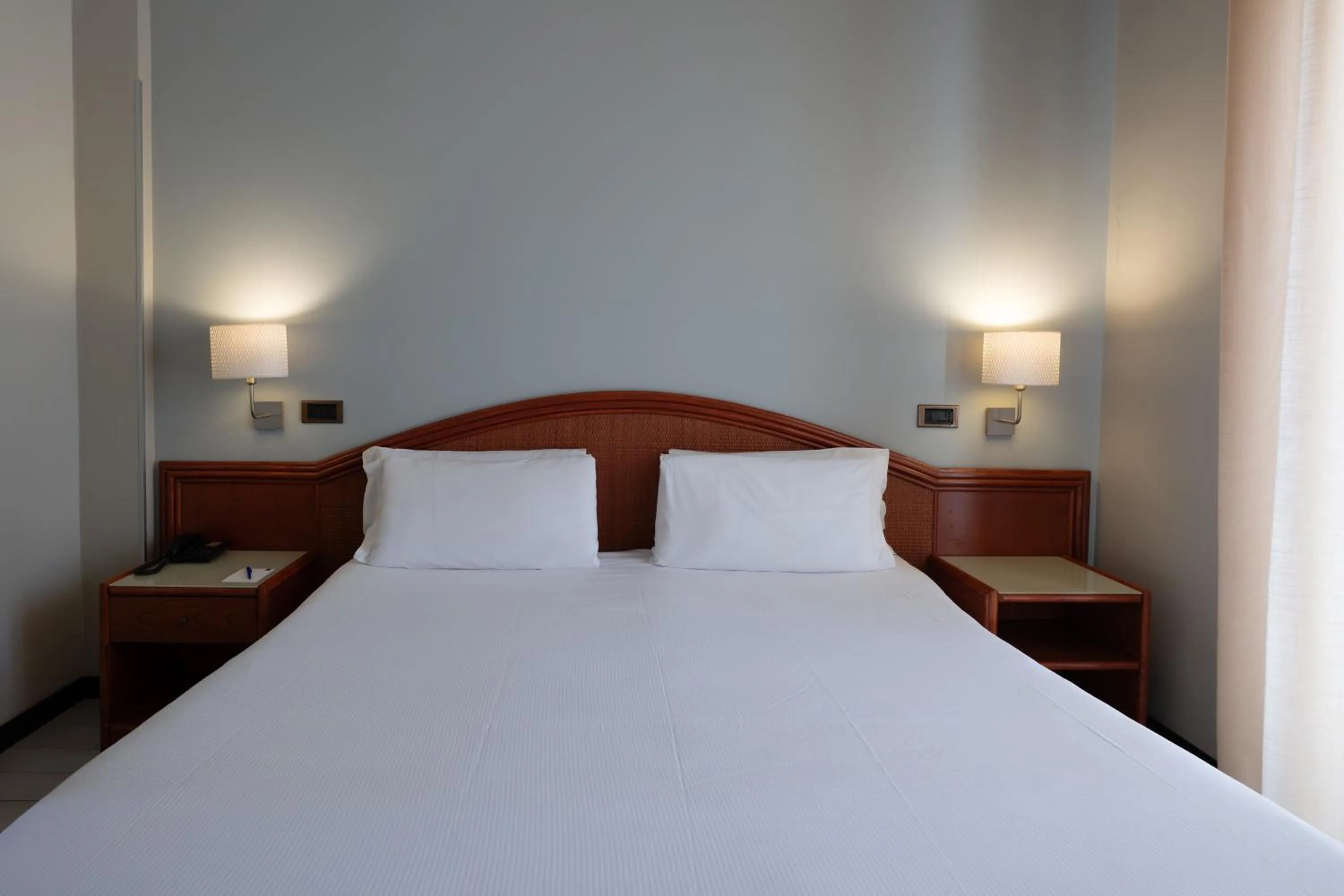 Bed in Hotel Riva Del Sole