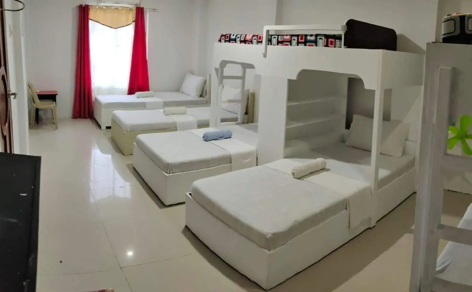 Bed in Island Hop Inn