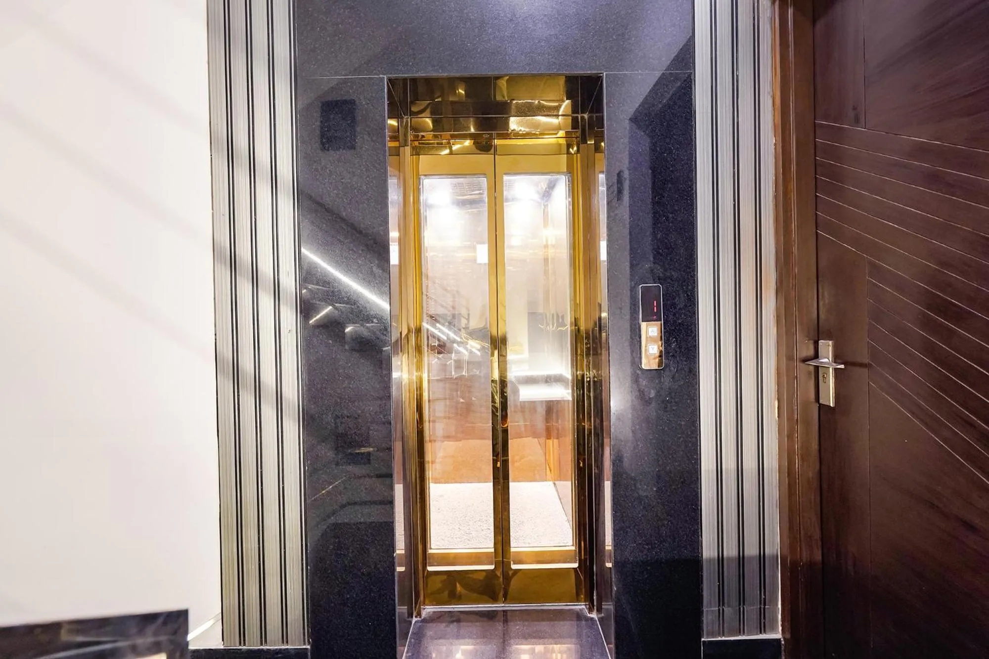 elevator in Treebo Tryst Embassy Inn