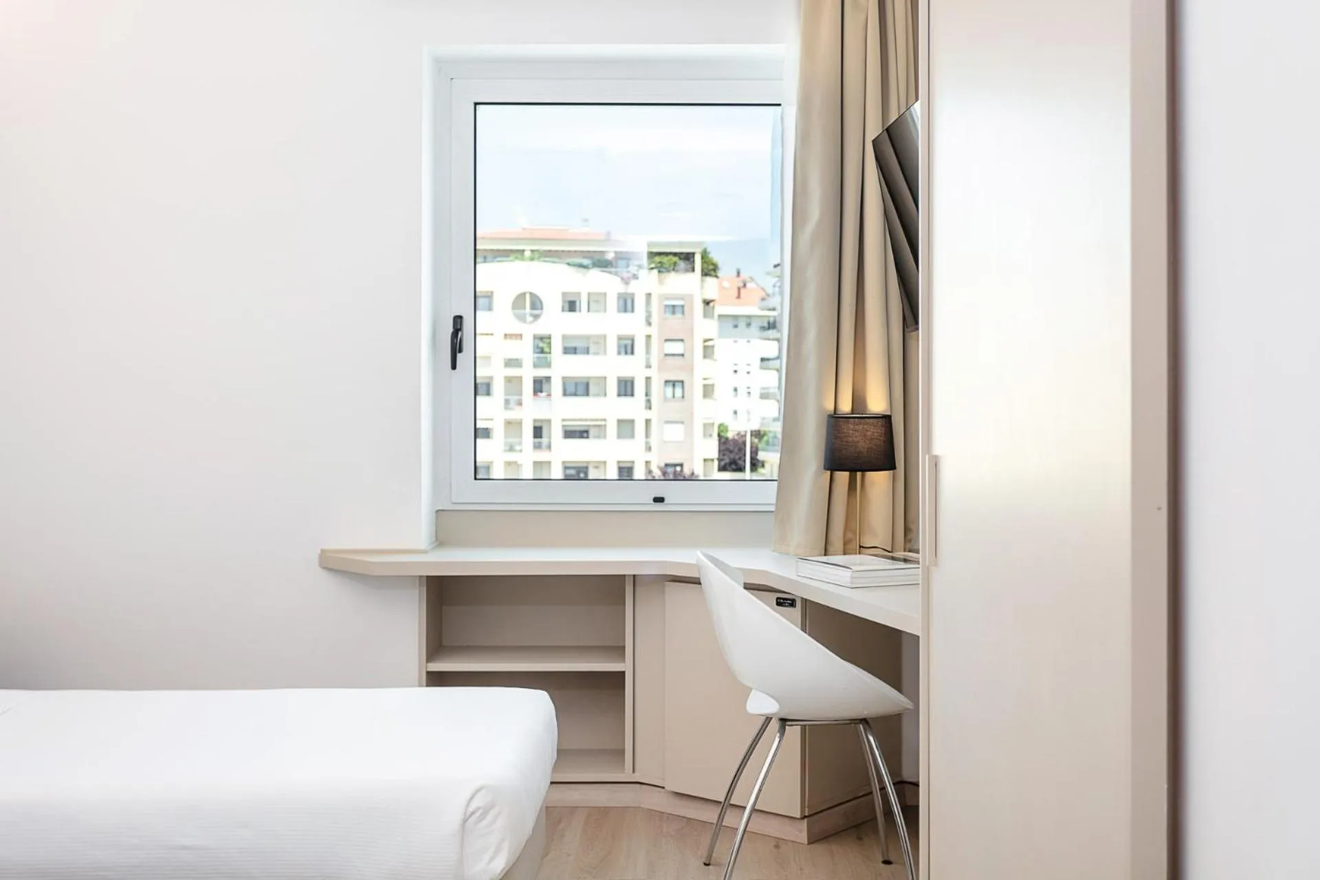 Photo of the whole room, Bed in Hotel Carlo Felice Sassari