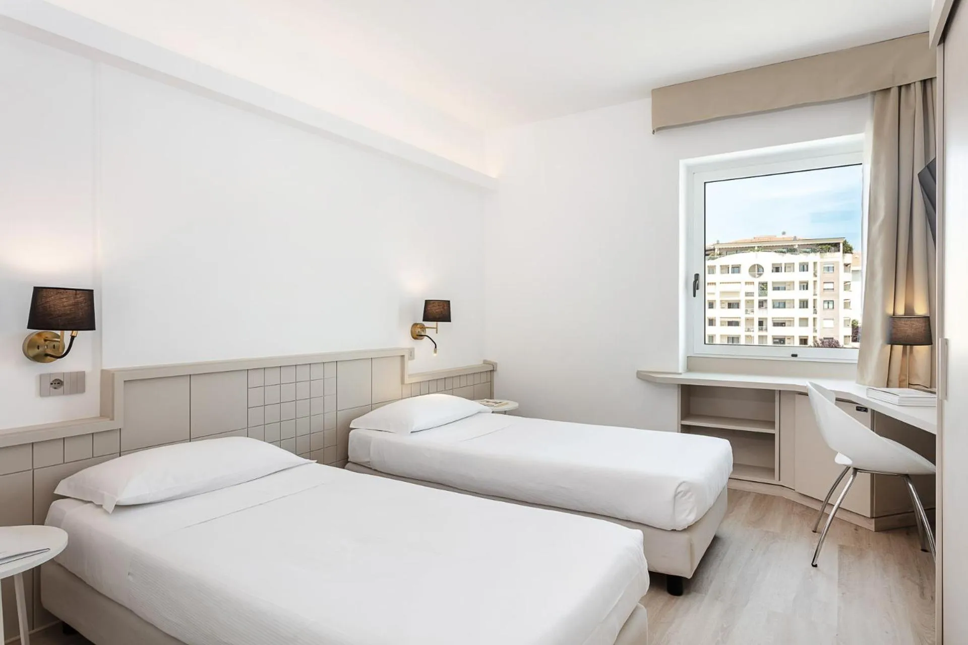 Bed in Hotel Carlo Felice Sassari