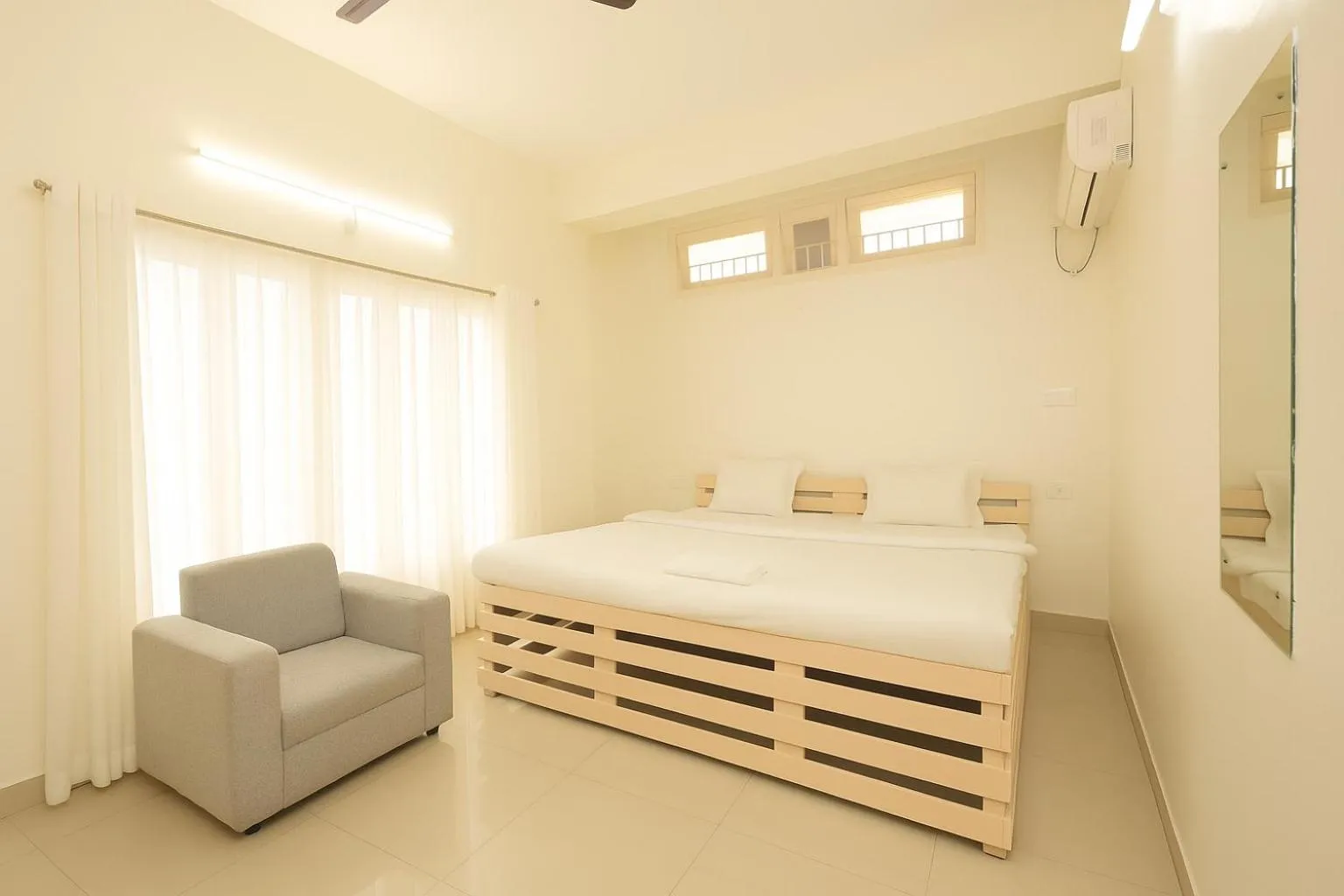 Photo of the whole room, Bed in Urban Inn Rukminigaon