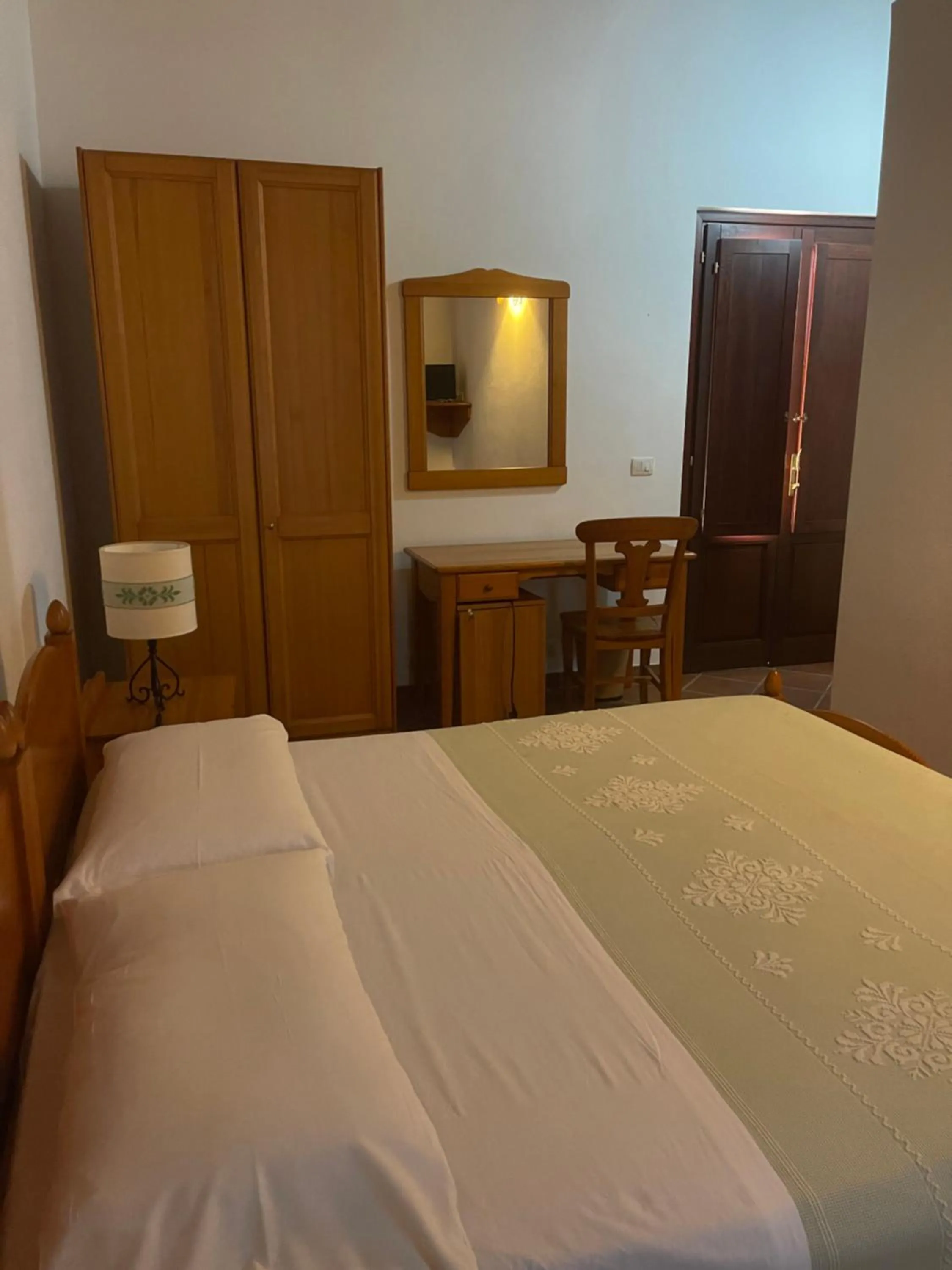 Bed in Hotel Su Nuraxi