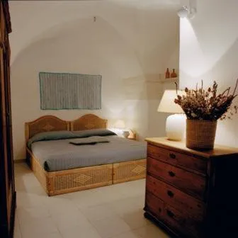 Photo of the whole room, Bed in Villaggio In Case Sparse Nel Centro Storico