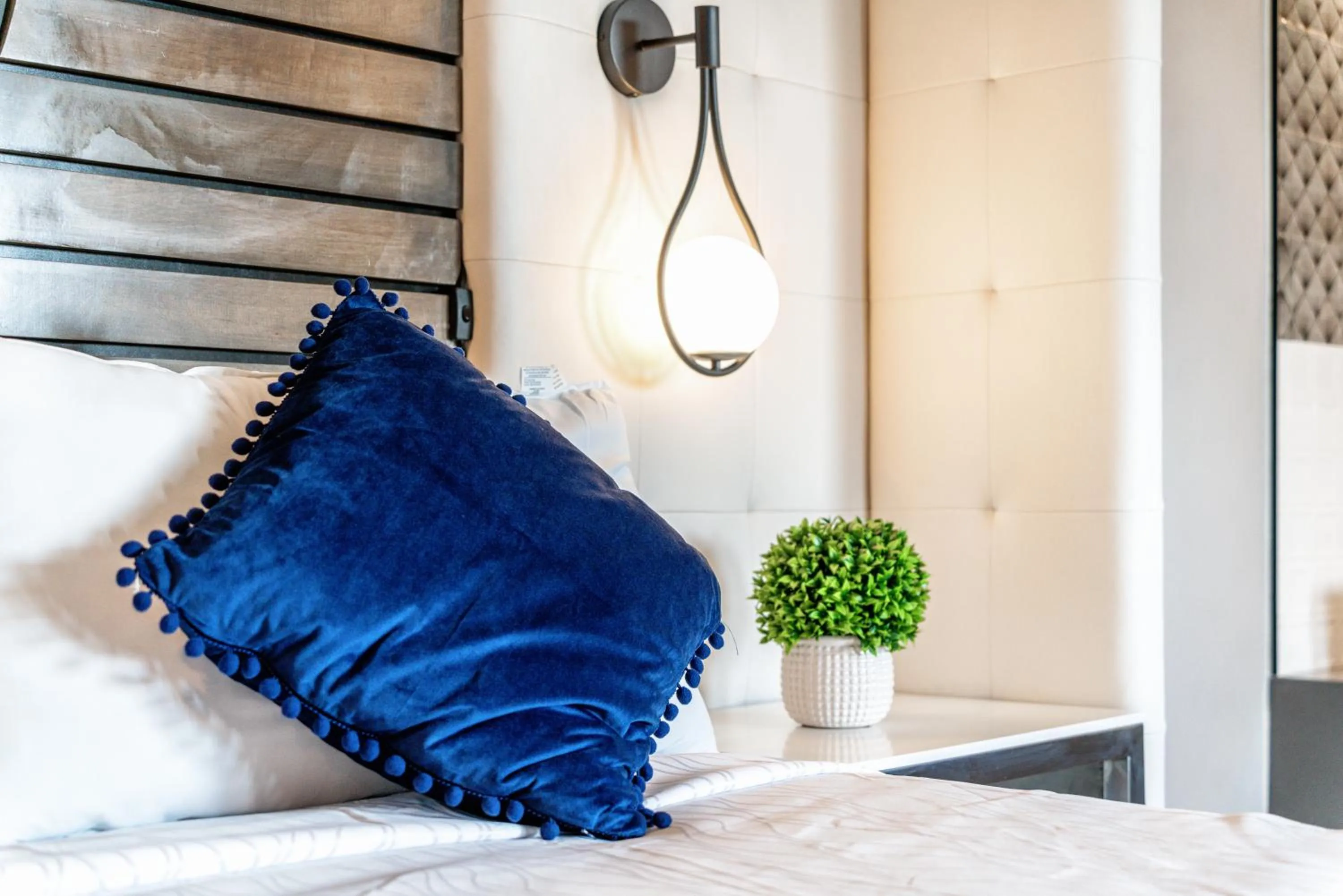 Bed in Aspire Inn Studios & Spas