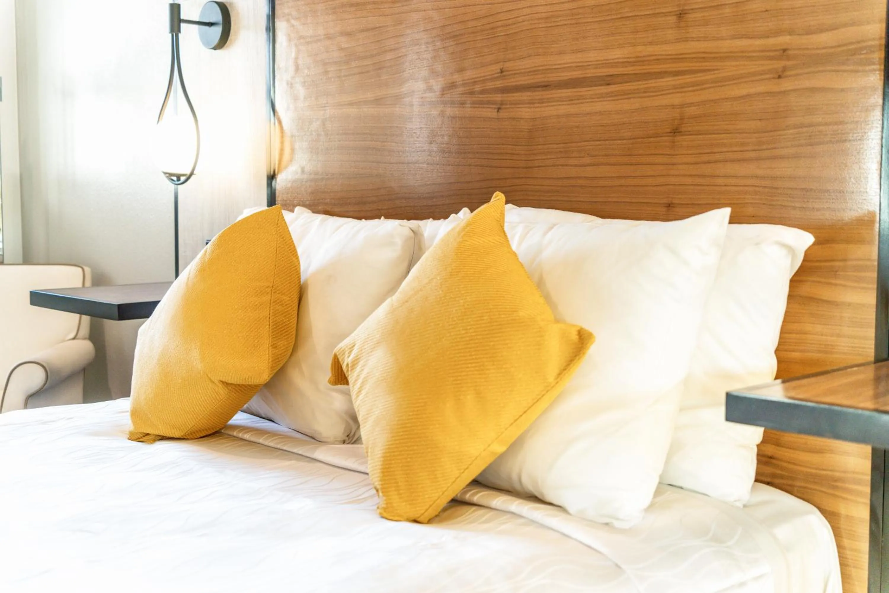 Bed in Aspire Inn Studios & Spas