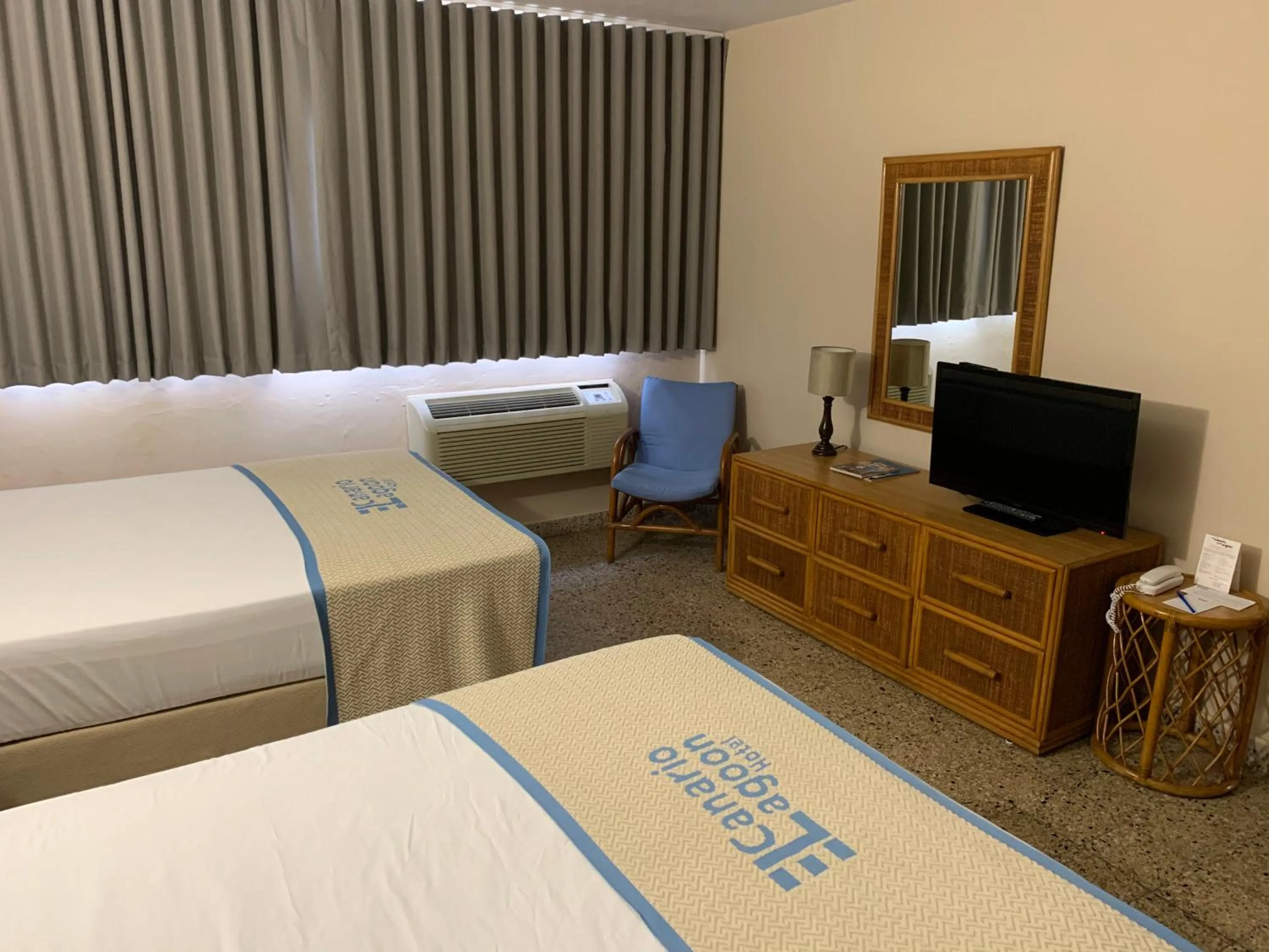 Bed in Canario Lagoon Hotel