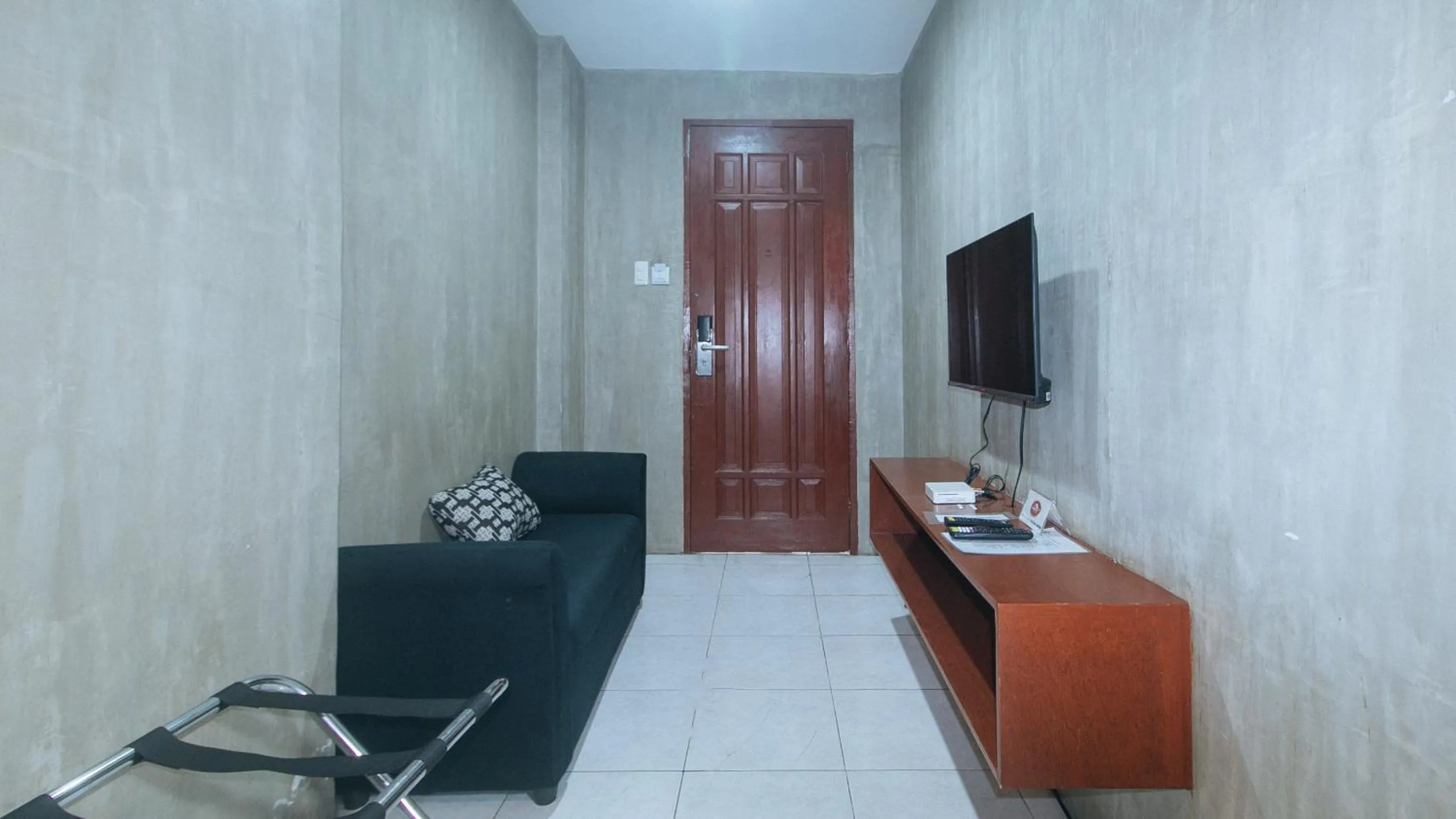 TV and multimedia in Rcee Place by RedDoorz
