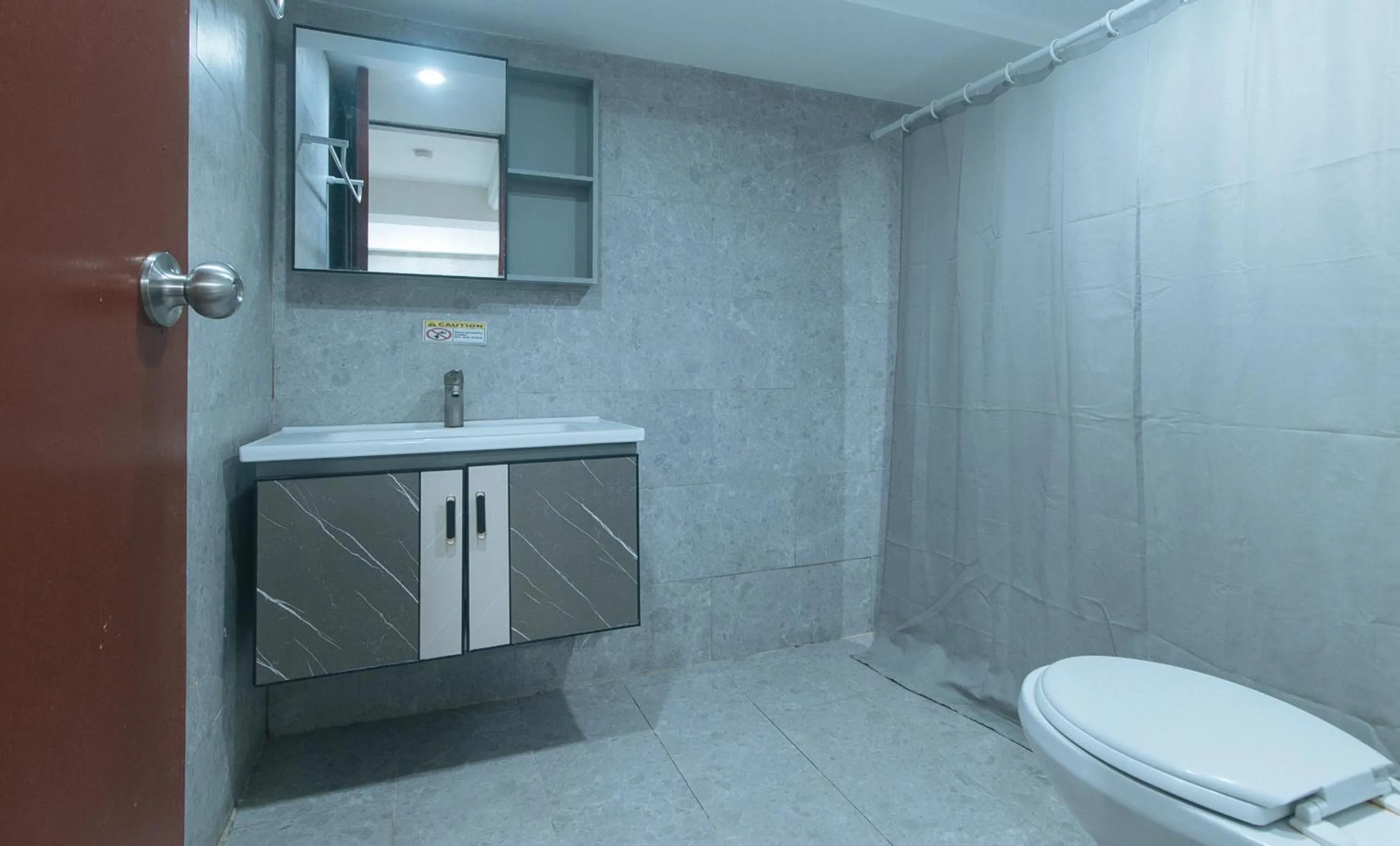 Shower in Rcee Place by RedDoorz