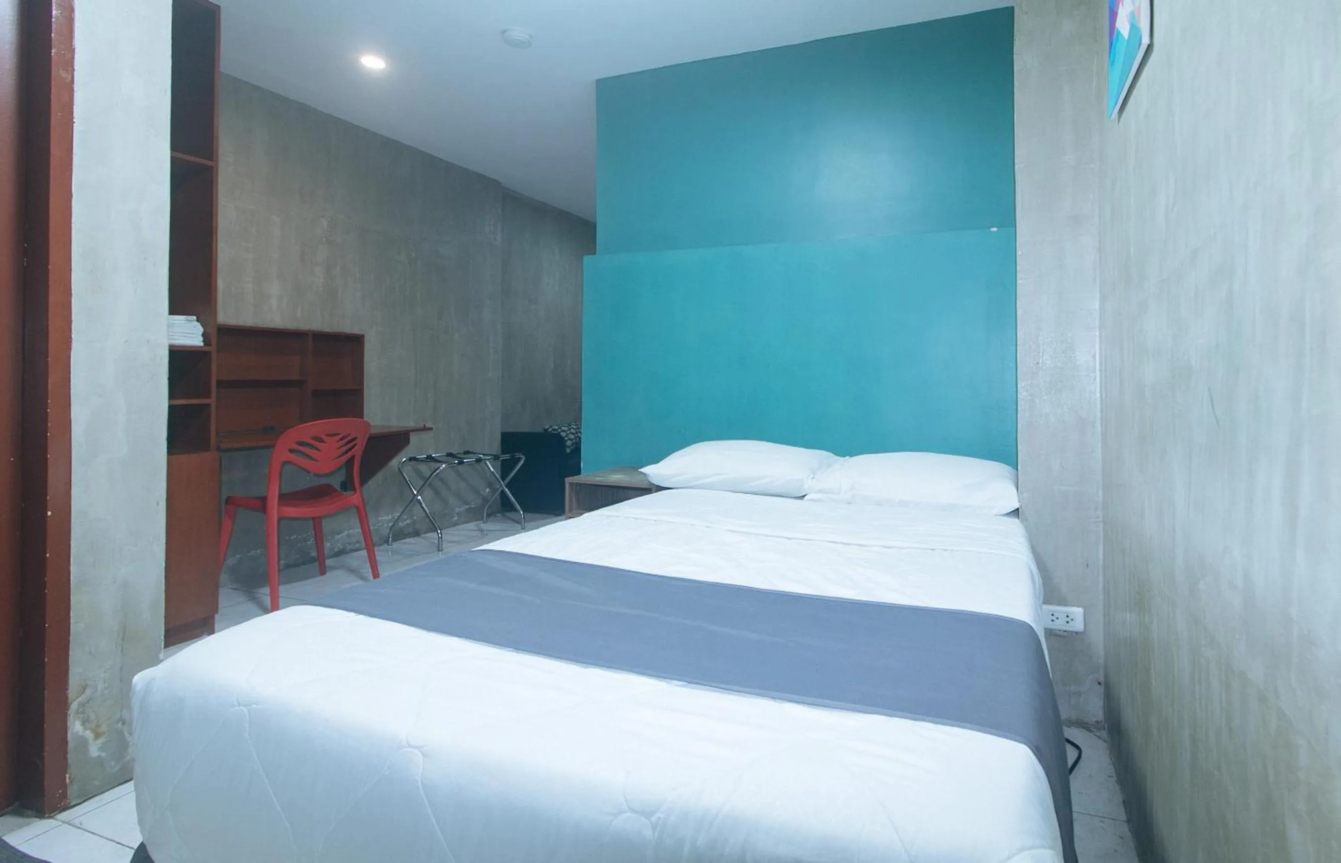 Bed in Rcee Place by RedDoorz