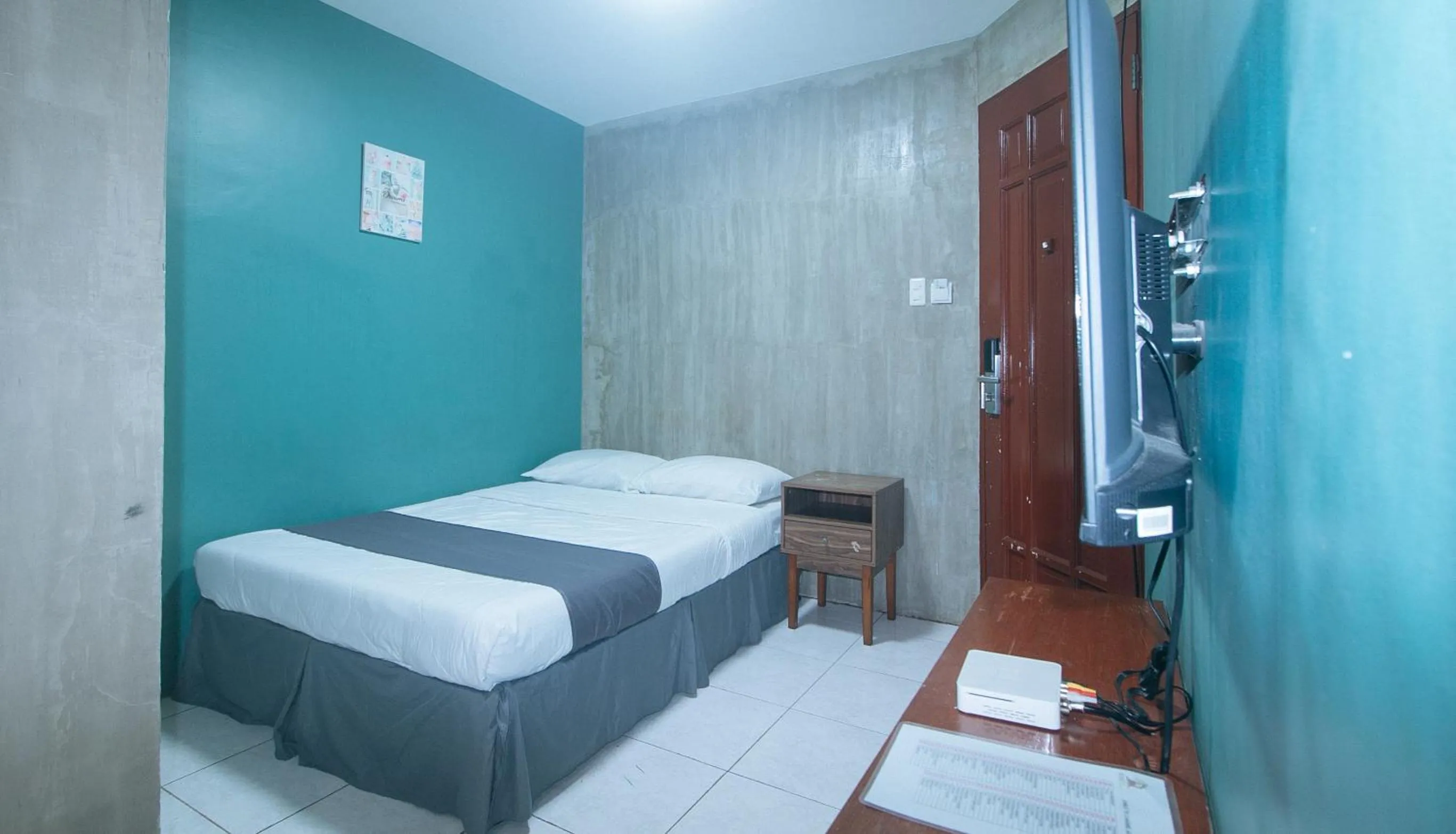 Bed in Rcee Place by RedDoorz