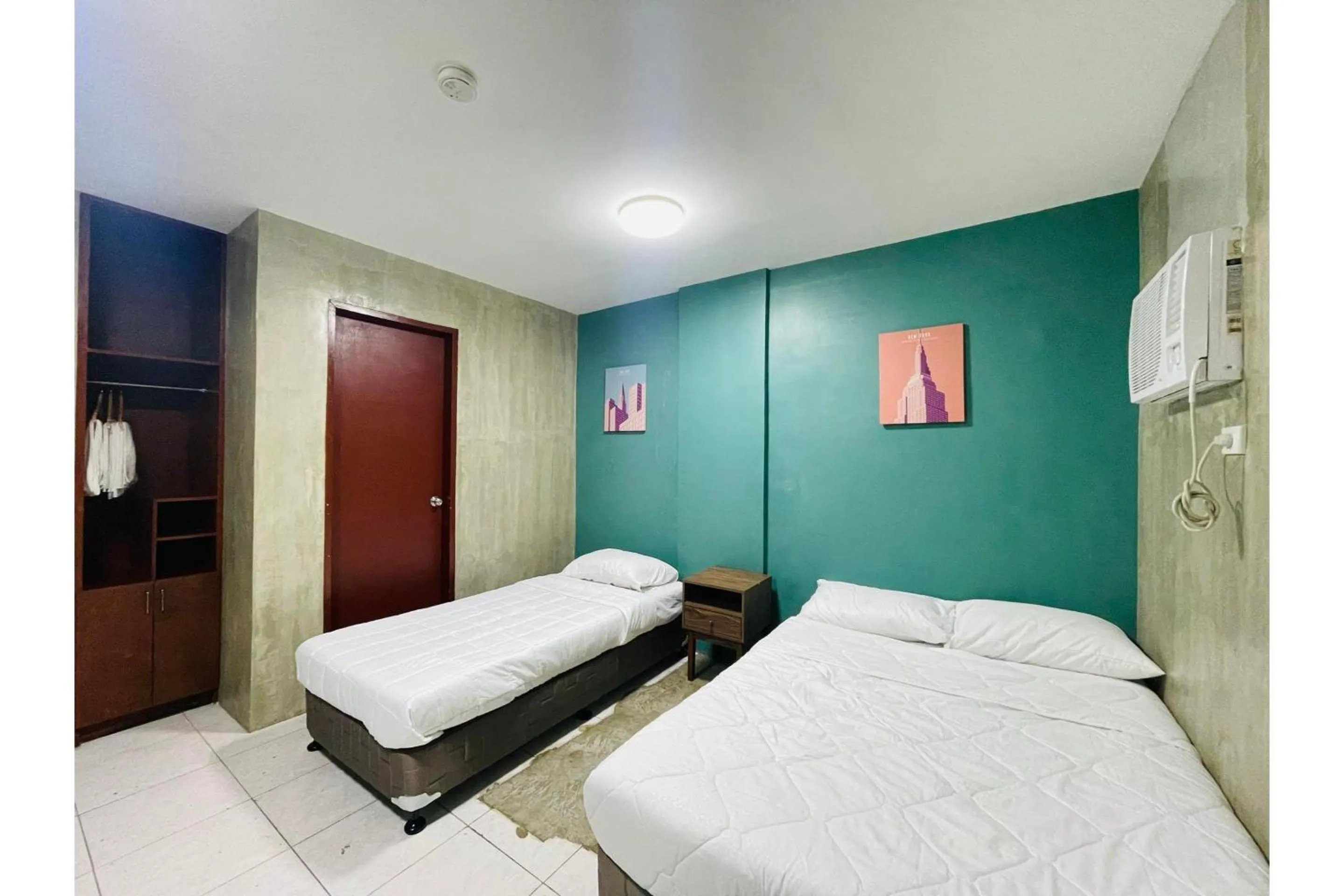 Deluxe Triple Room in Rcee Place by RedDoorz