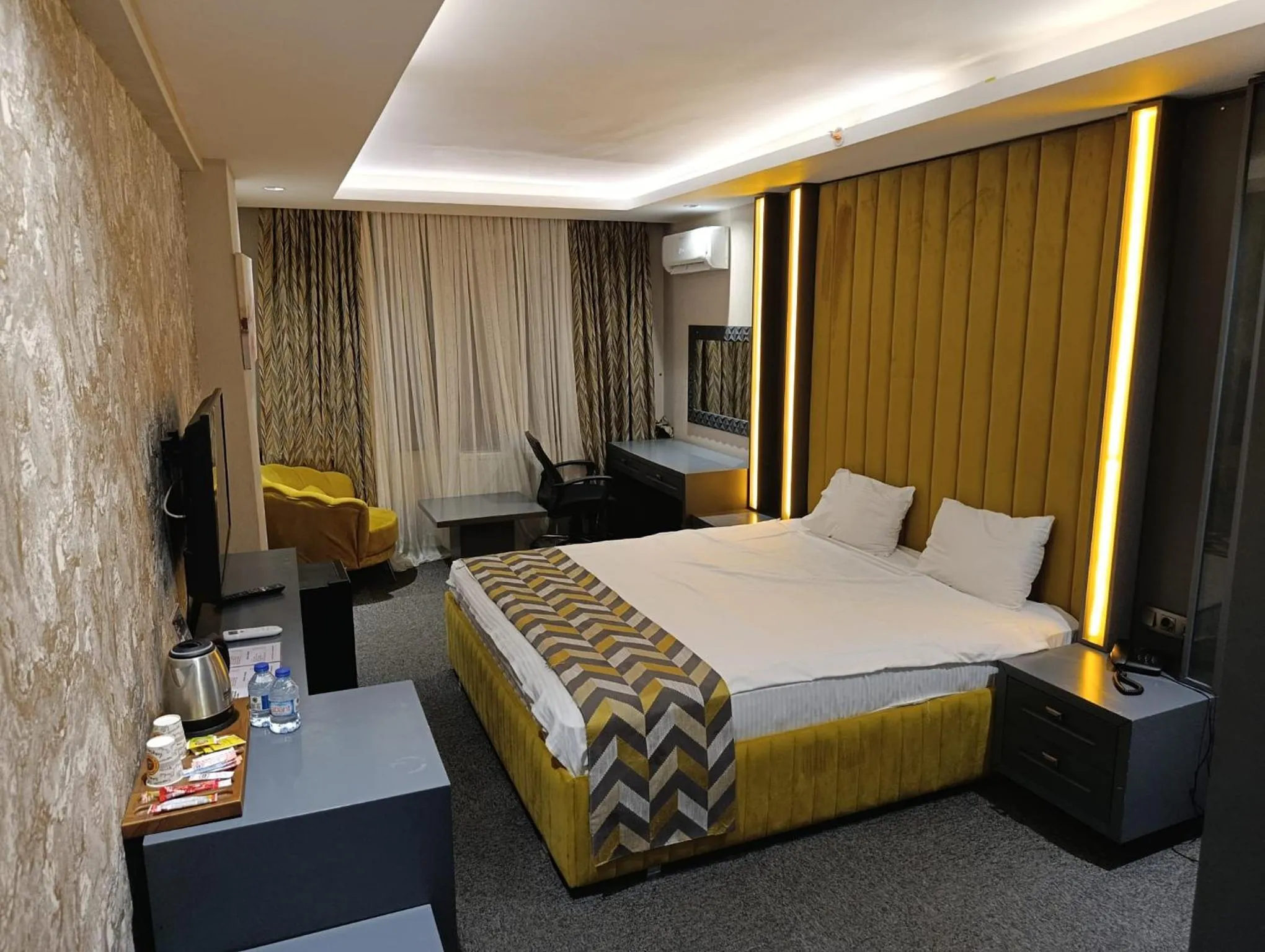 Bed in GRAND DORA HOTEL