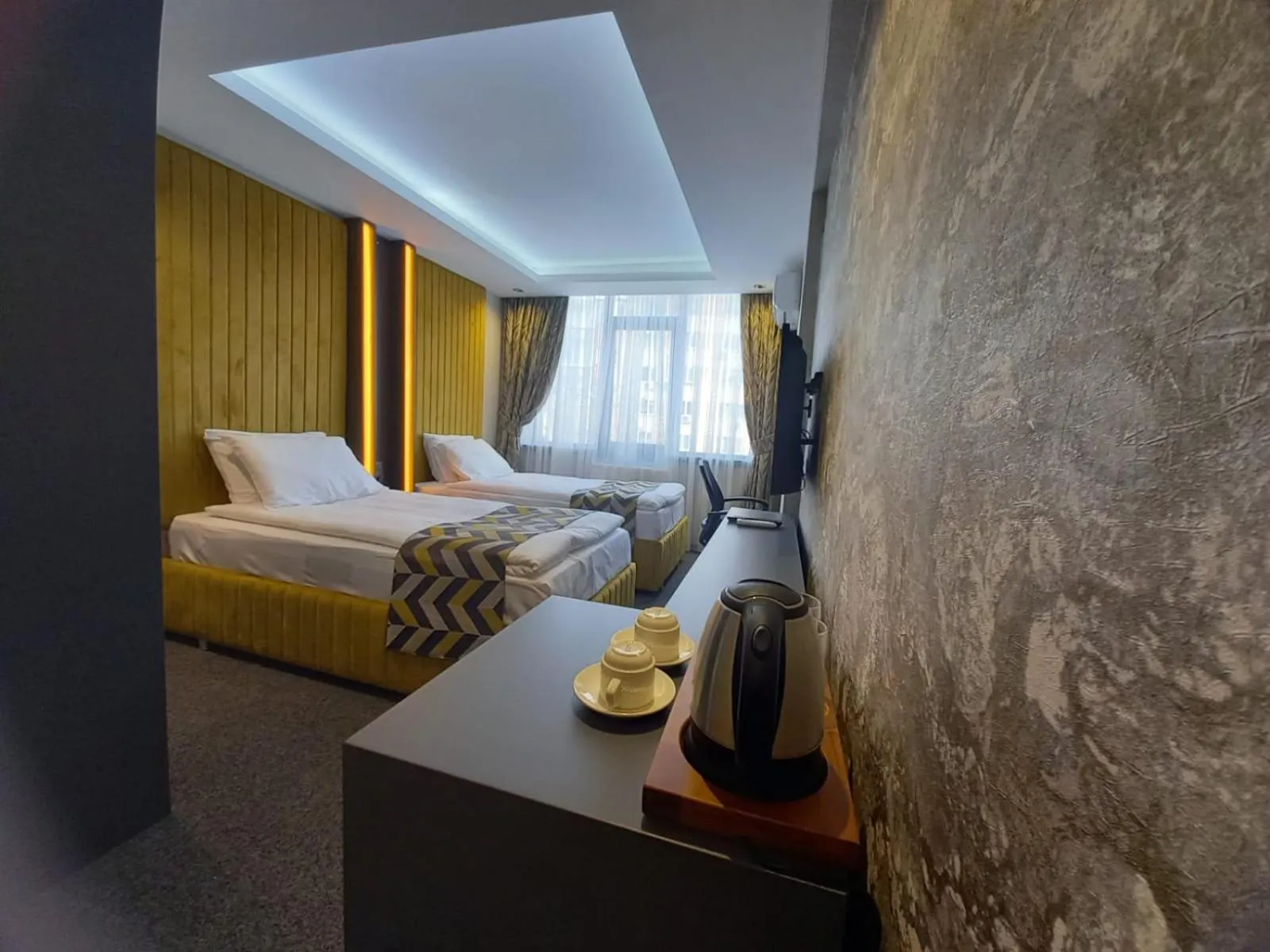 Bed in GRAND DORA HOTEL