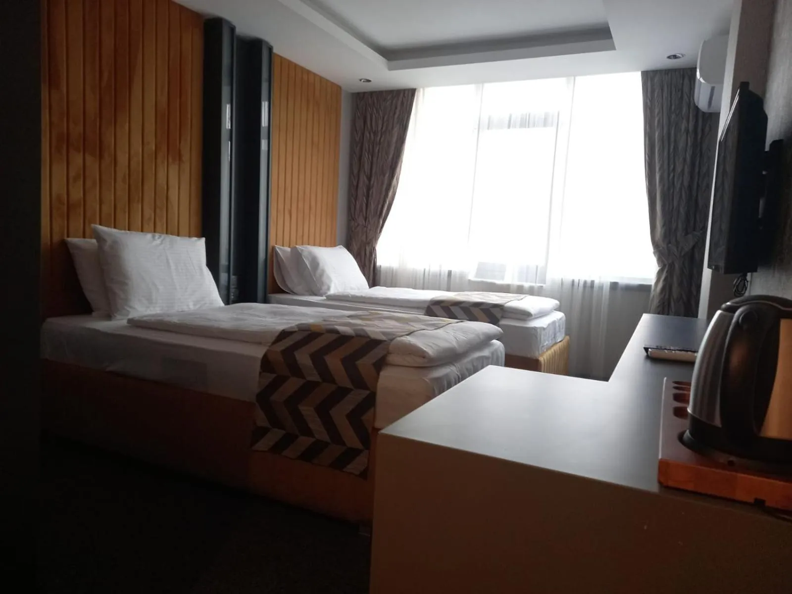 Bed in GRAND DORA HOTEL