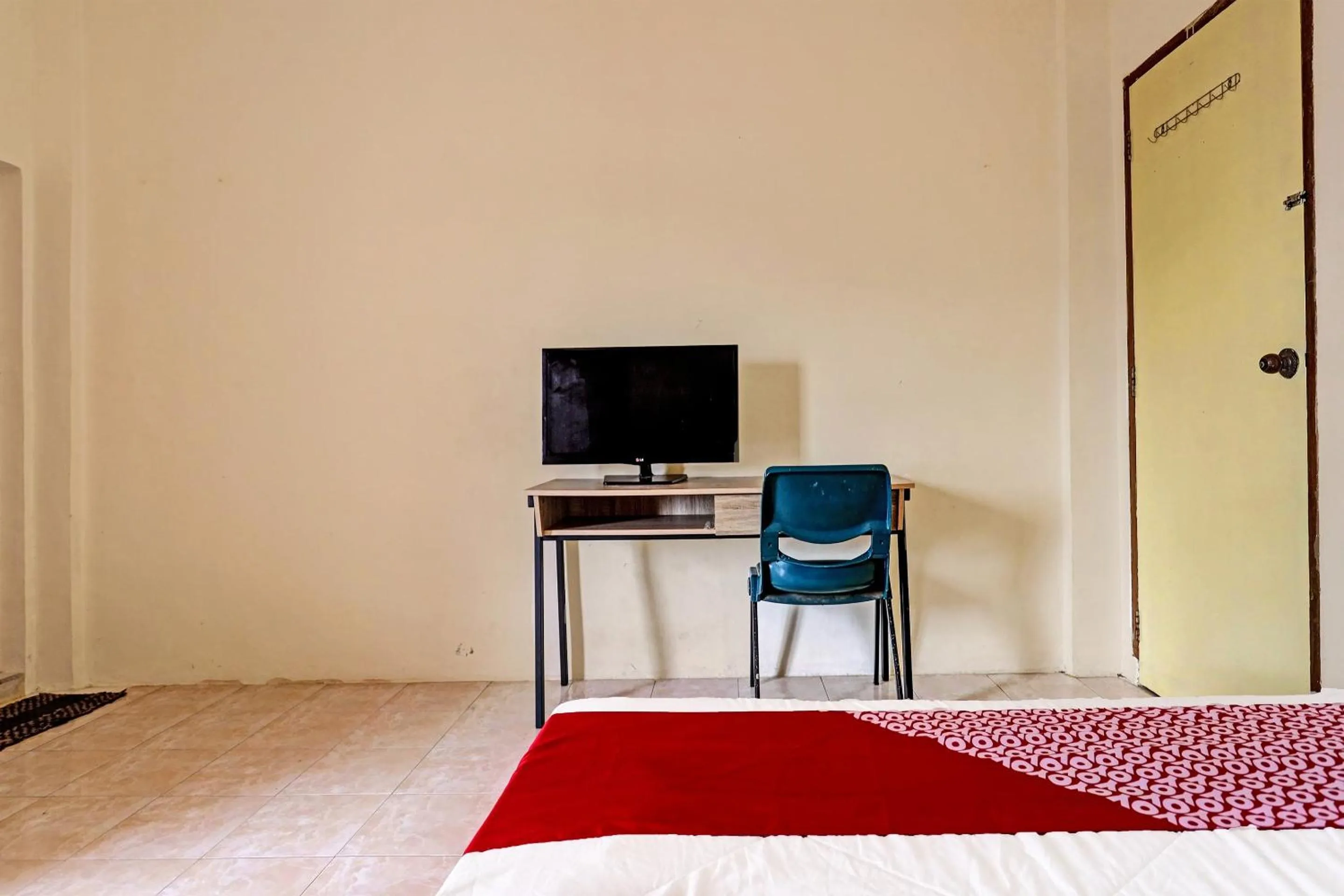 Bedroom in OYO 91636 Kak Dadut Homestay