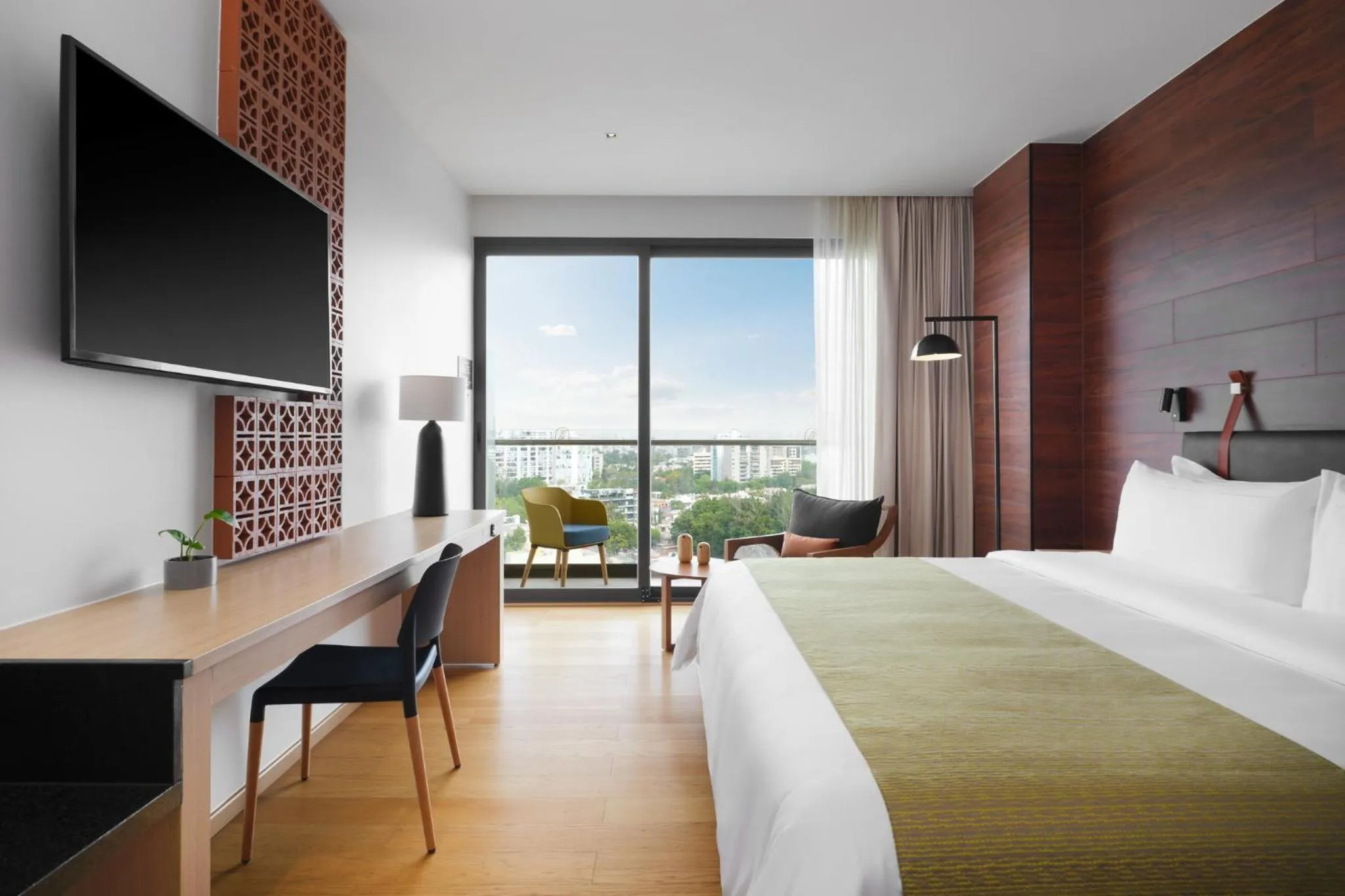 Photo of the whole room, Bed in voco Guadalajara Neruda by IHG