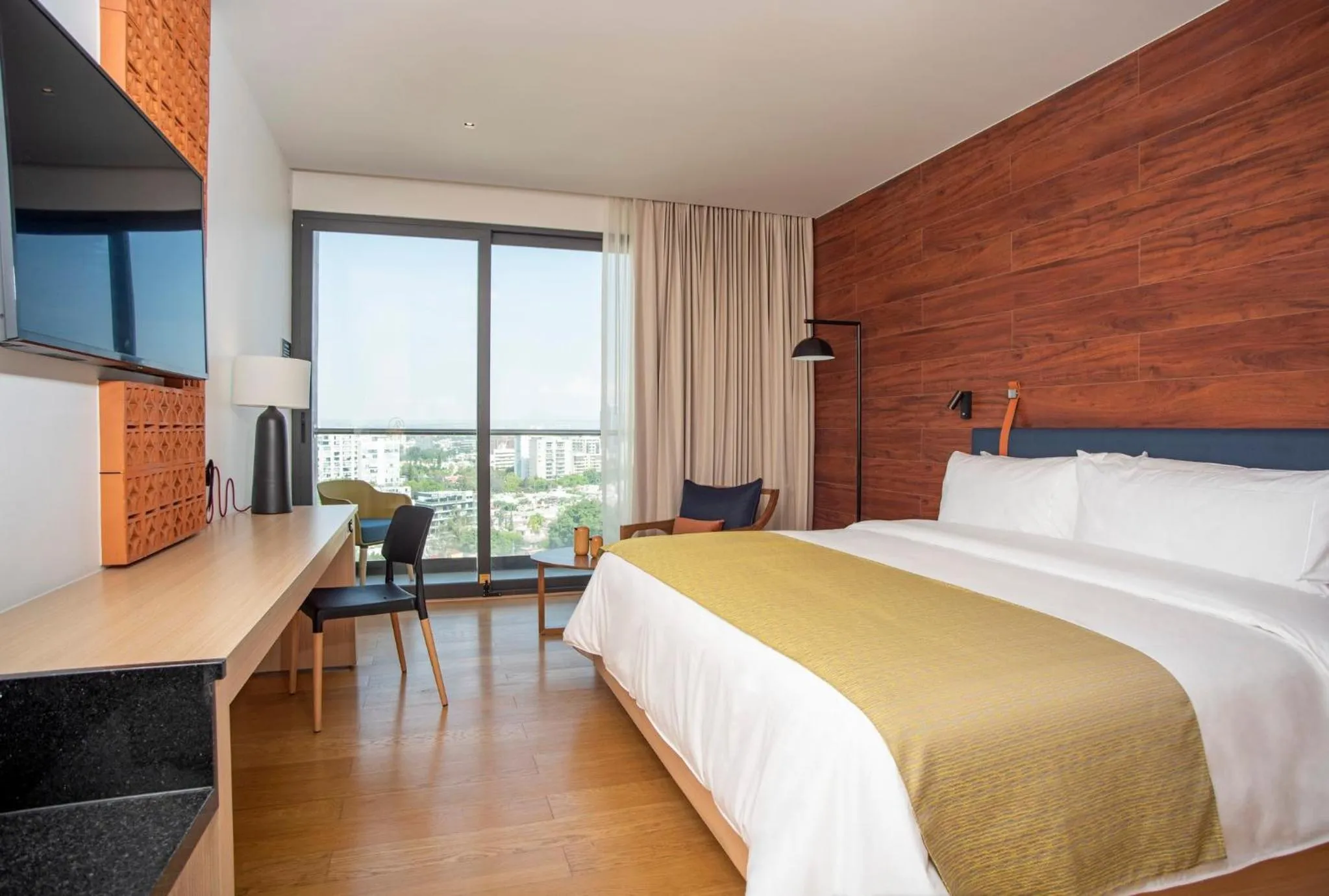 Photo of the whole room, Bed in voco Guadalajara Neruda by IHG