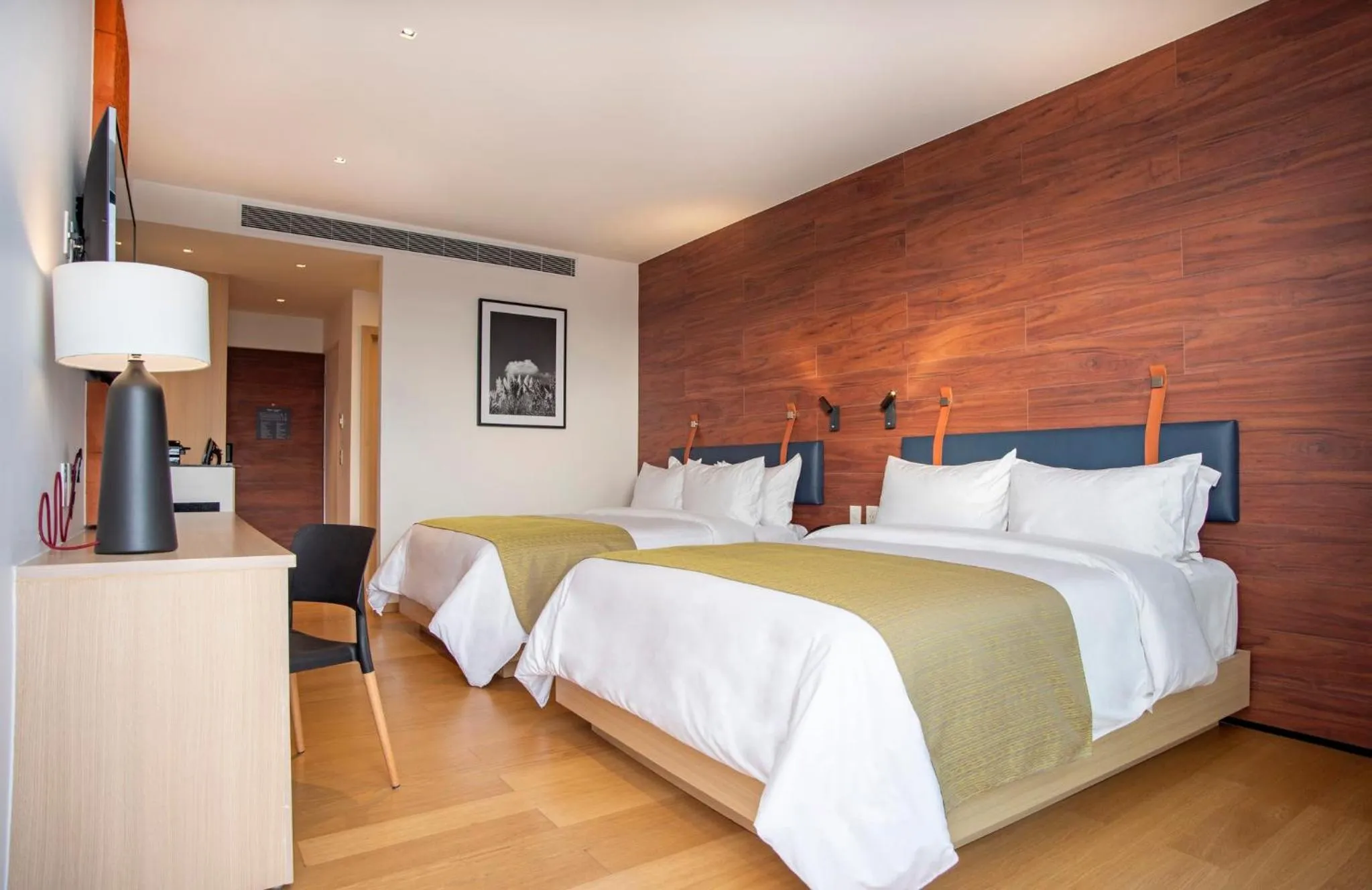 Photo of the whole room, Bed in voco Guadalajara Neruda by IHG