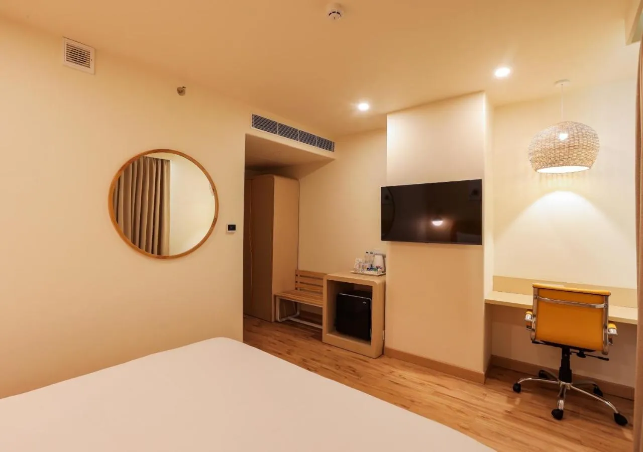 Photo of the whole room, Bed in Bloom Hotel - Jalandhar