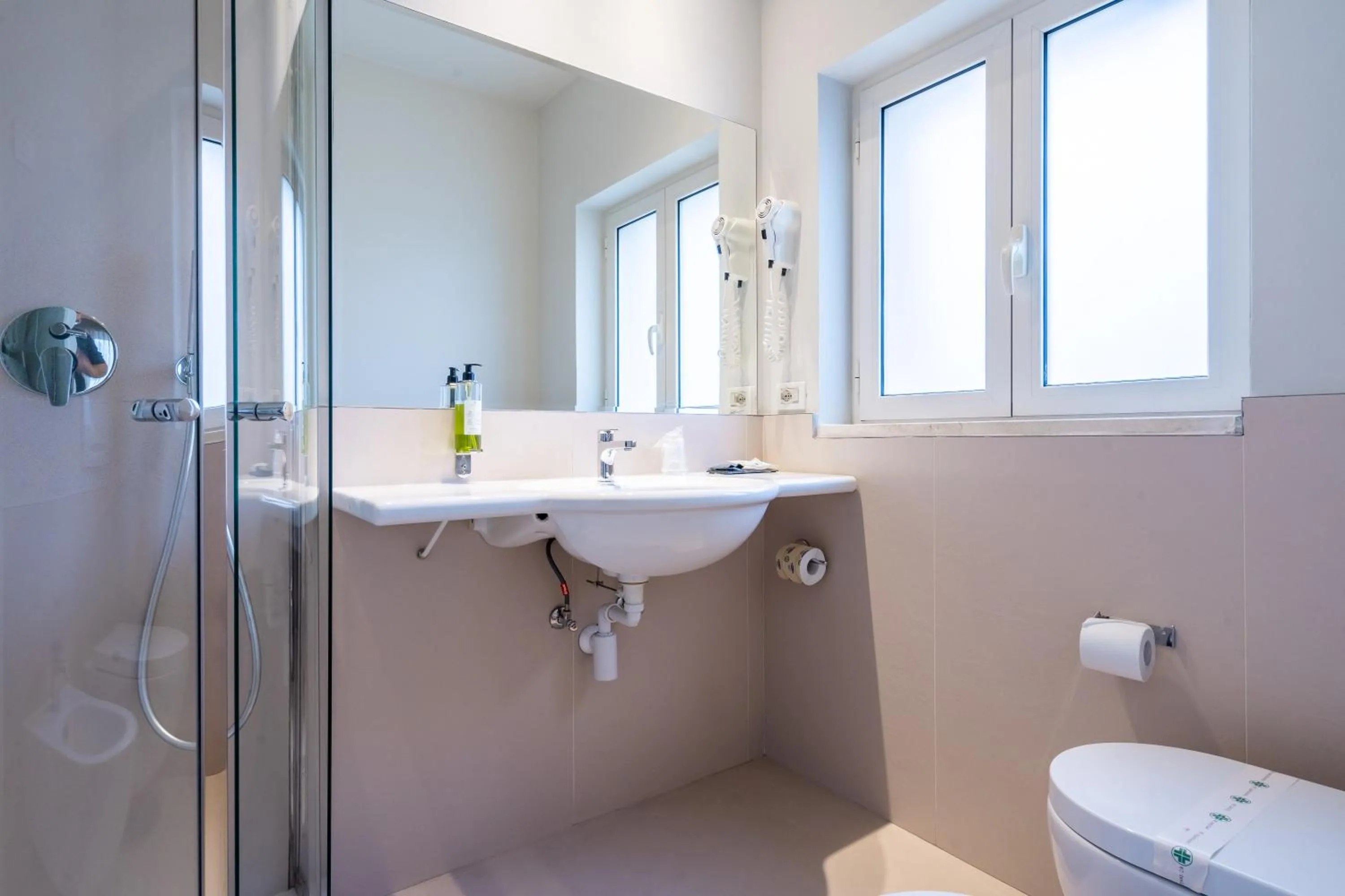 Bathroom in Hotel Regina Elena 57 & Oro Bianco SPA