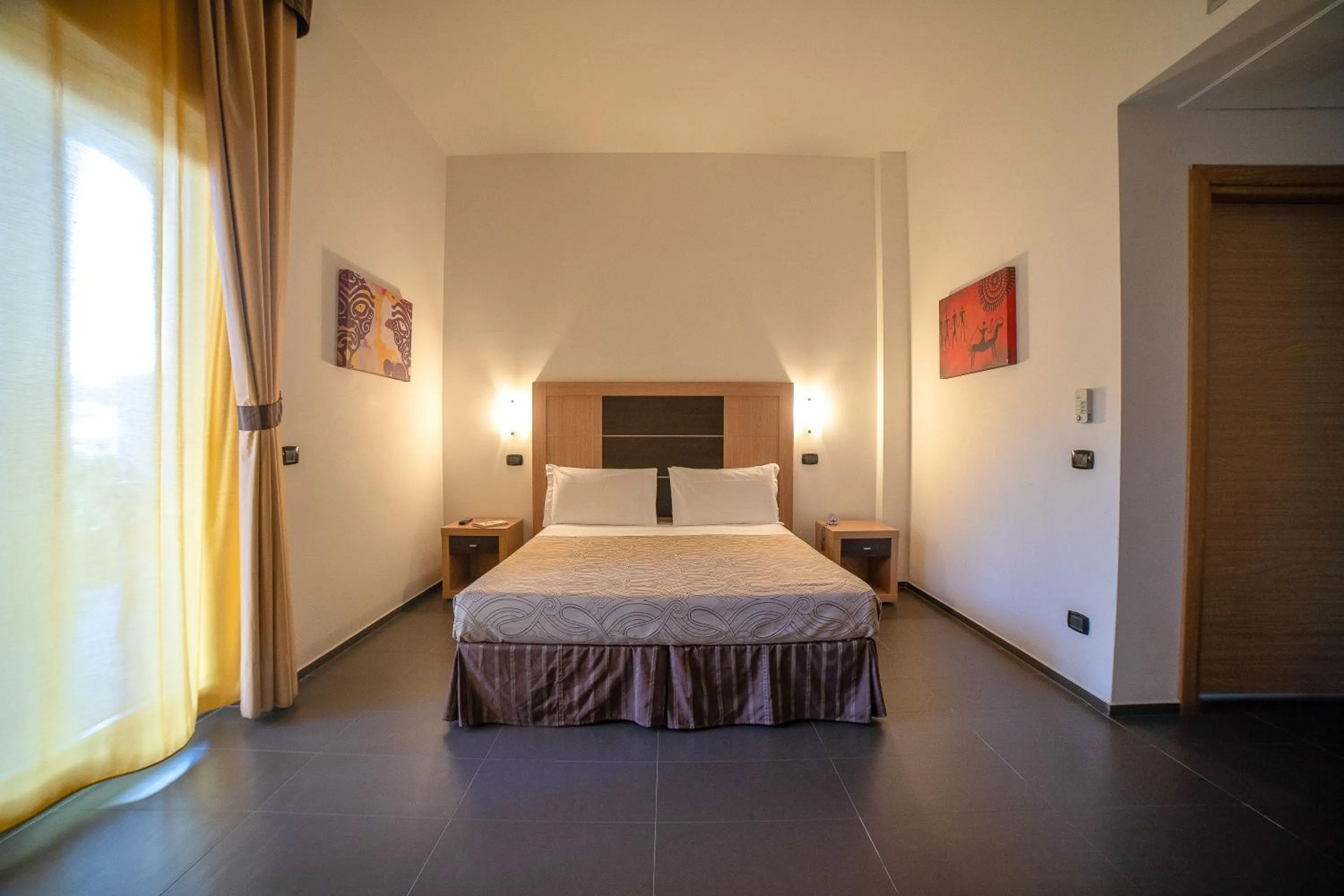 Bedroom in VOI Baia di Tindari Resort