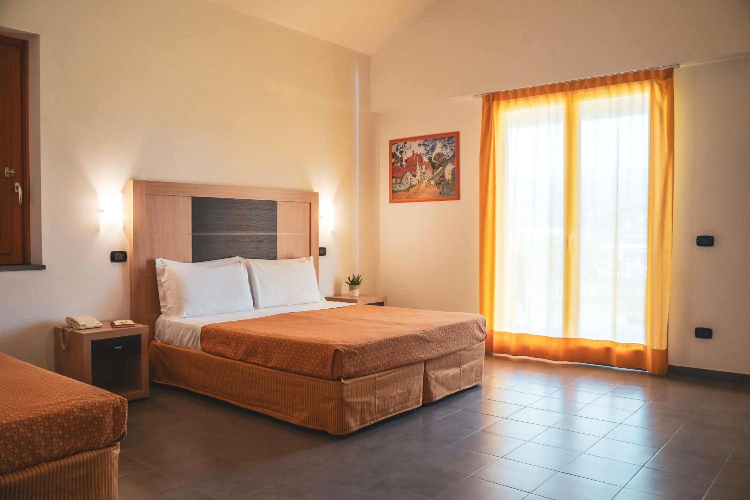 Bedroom in VOI Baia di Tindari Resort