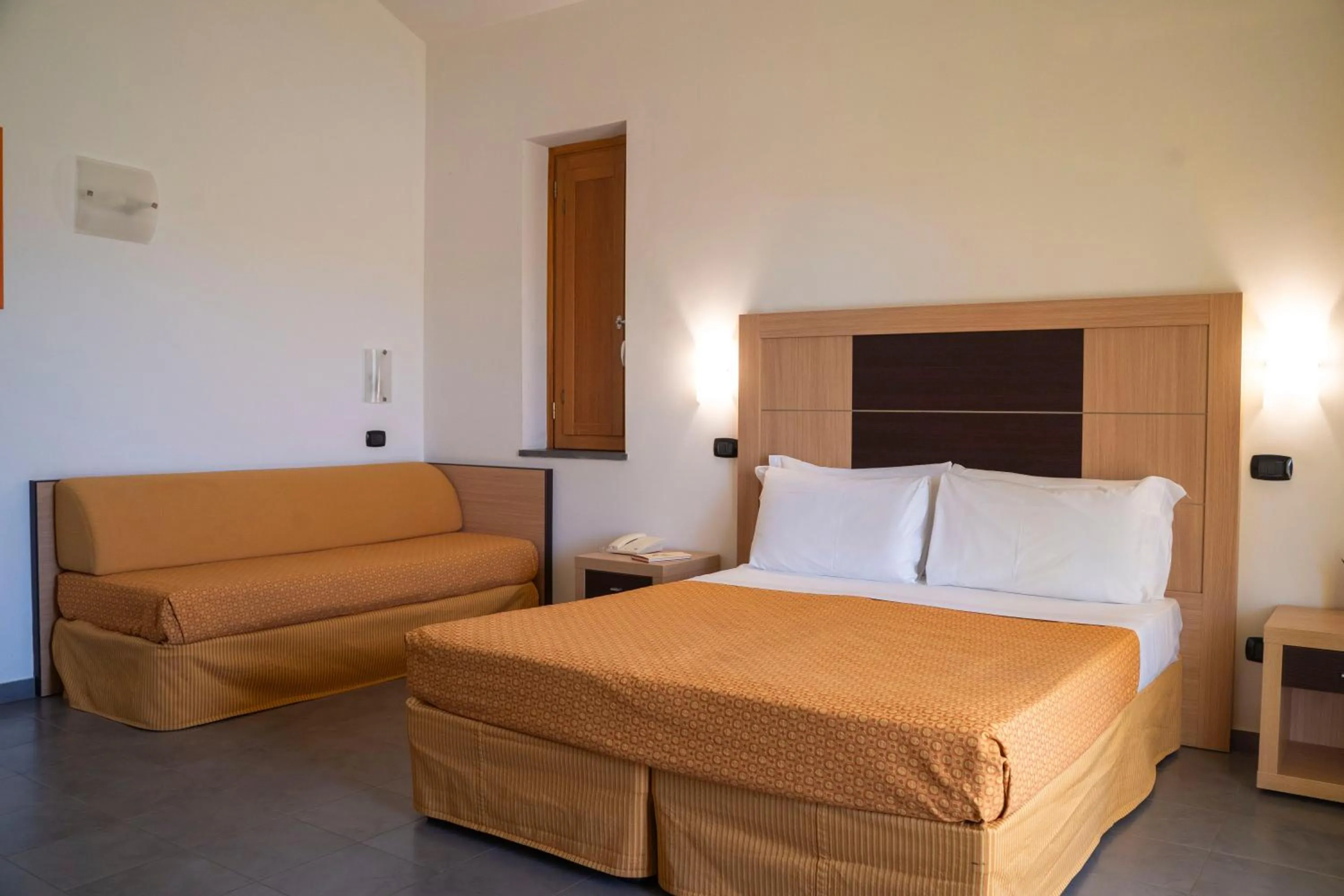 Bedroom in VOI Baia di Tindari Resort