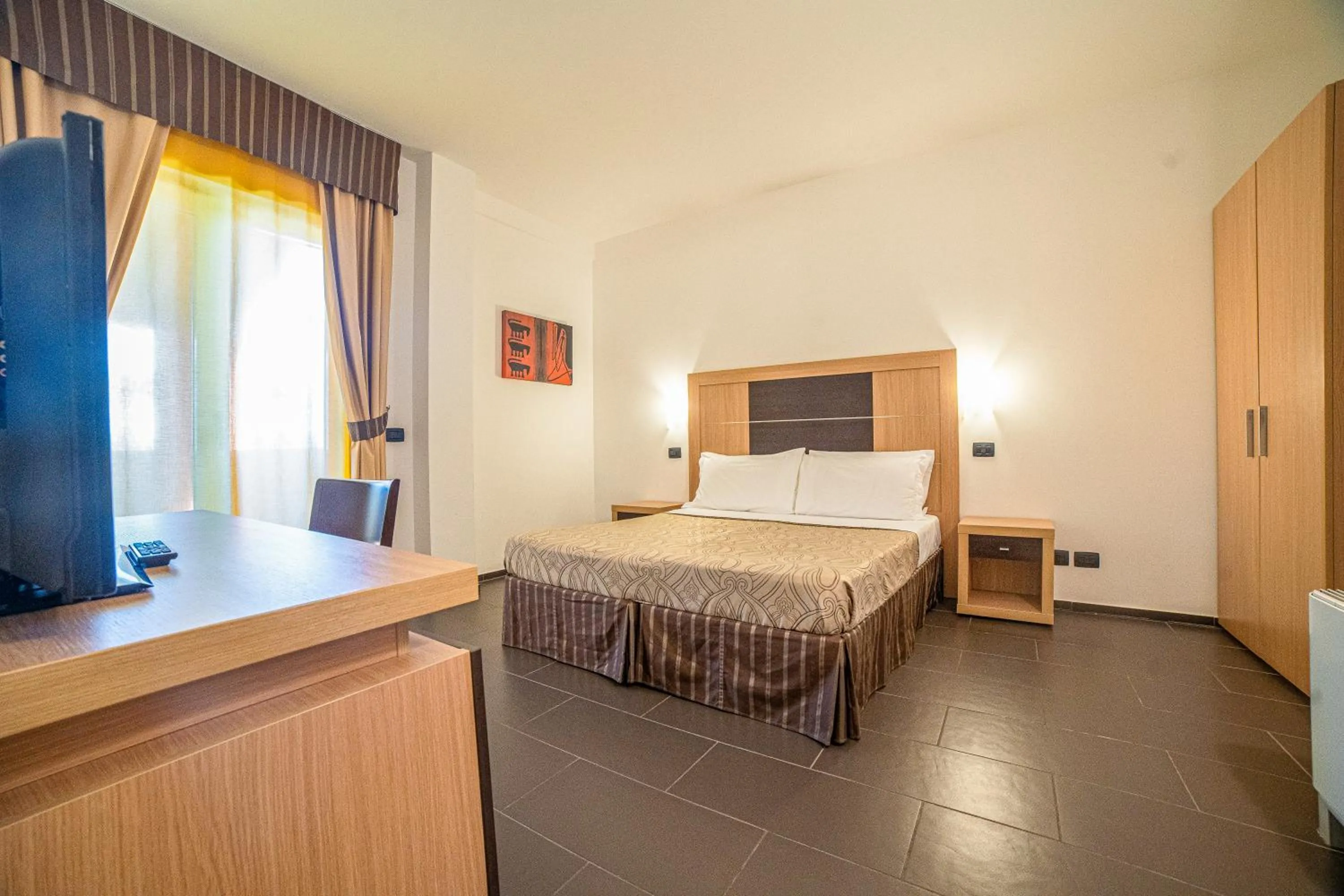 Bedroom in VOI Baia di Tindari Resort