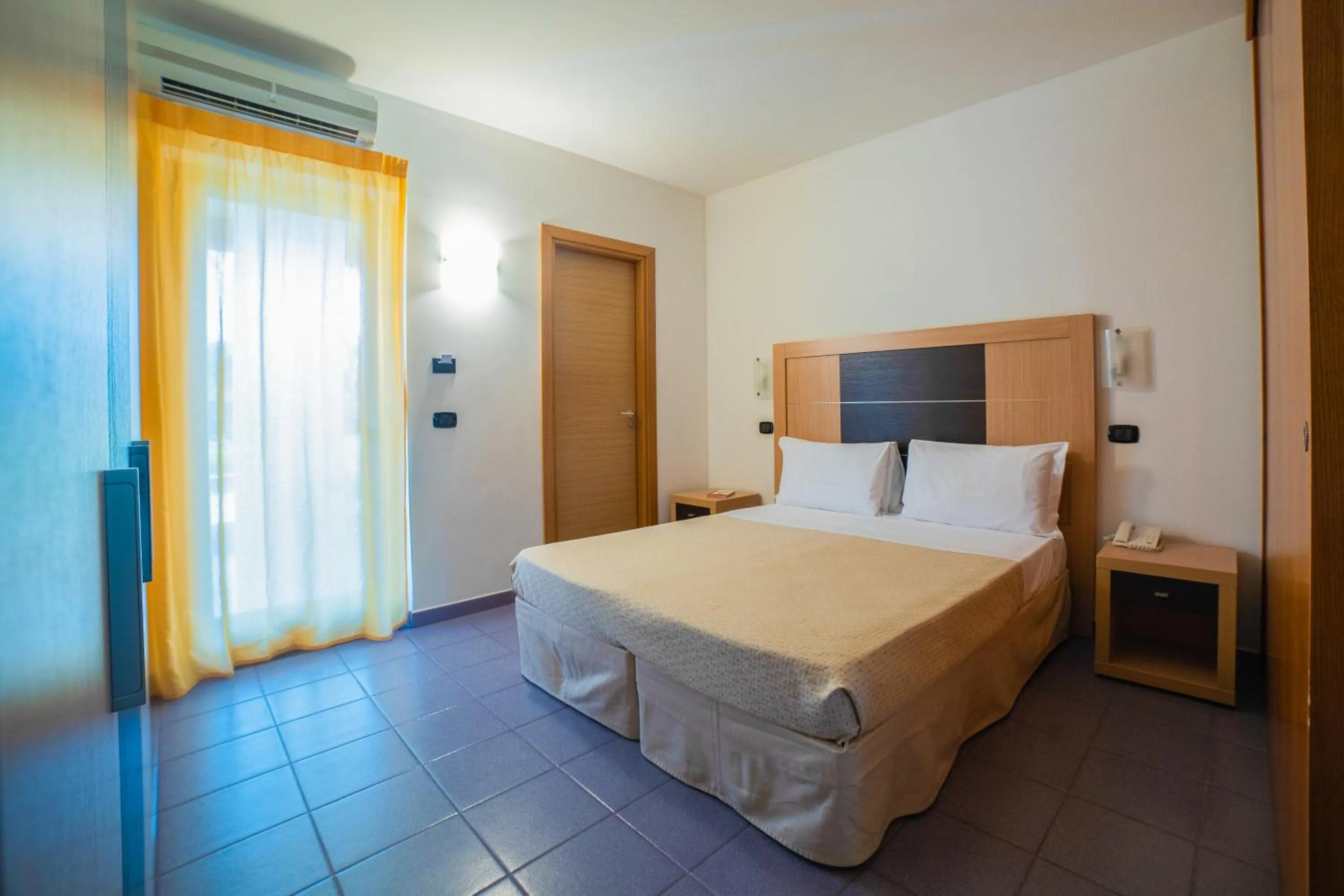 Bedroom in VOI Baia di Tindari Resort