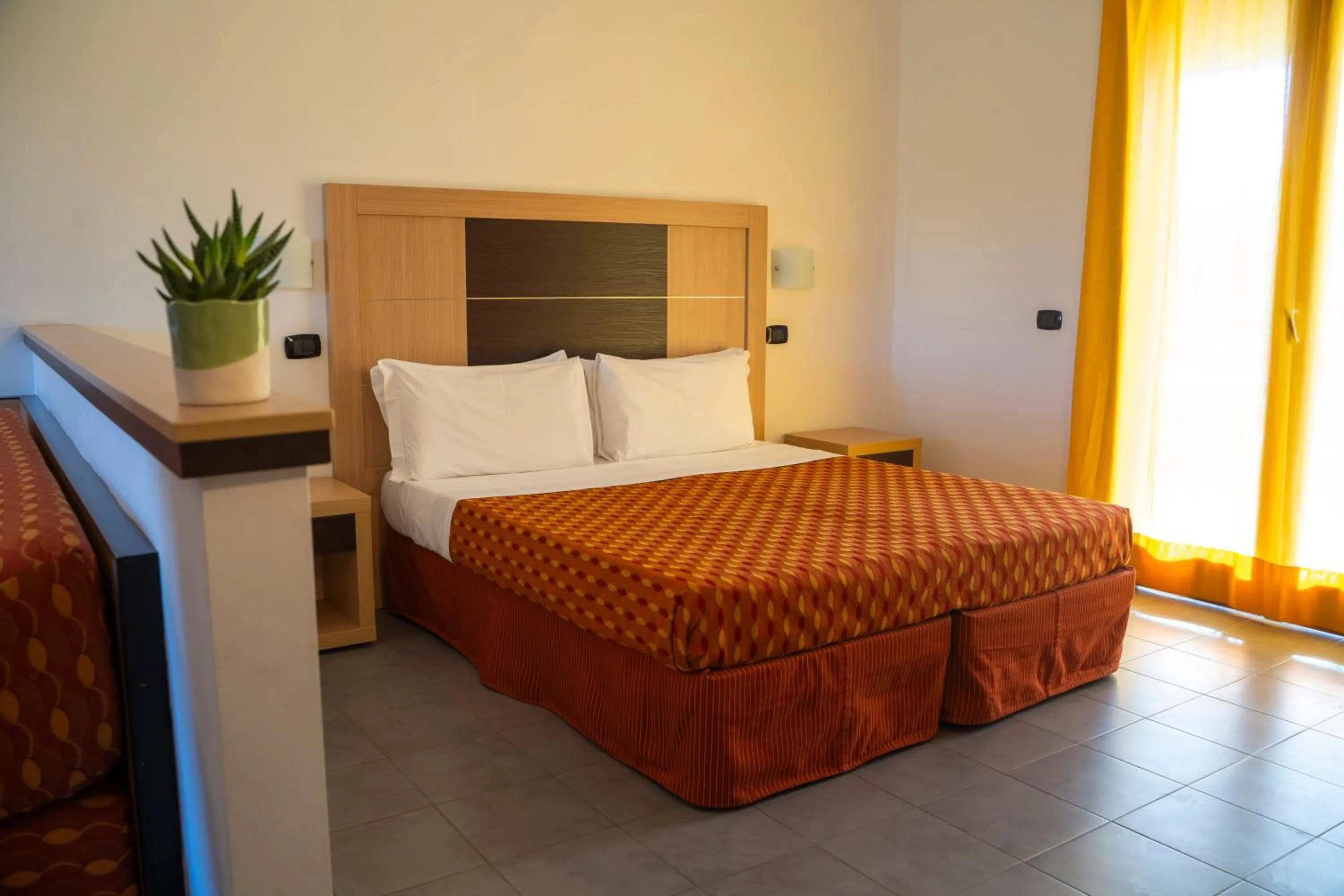 Bedroom in VOI Baia di Tindari Resort