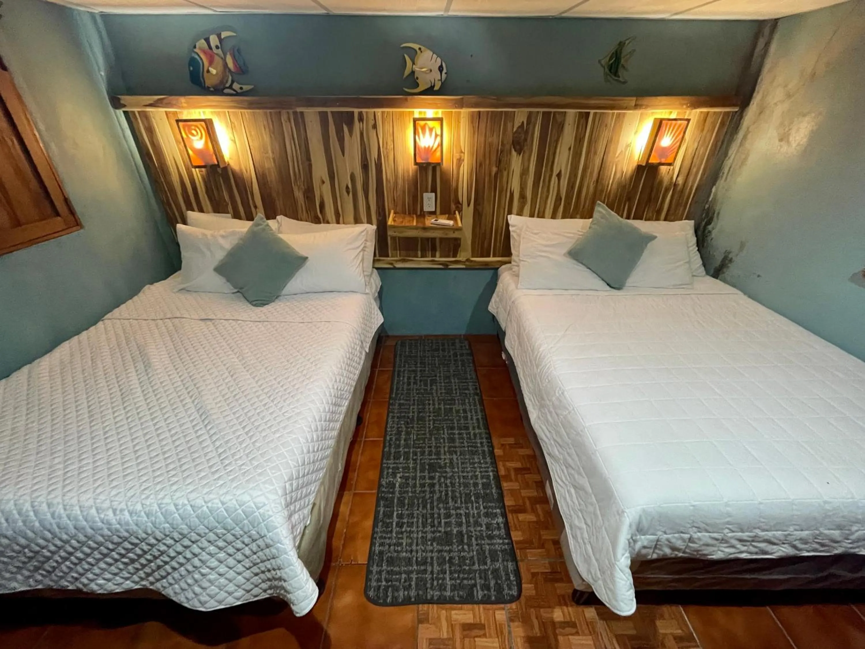 air conditioner, Bed in Johnnys Place Hotel