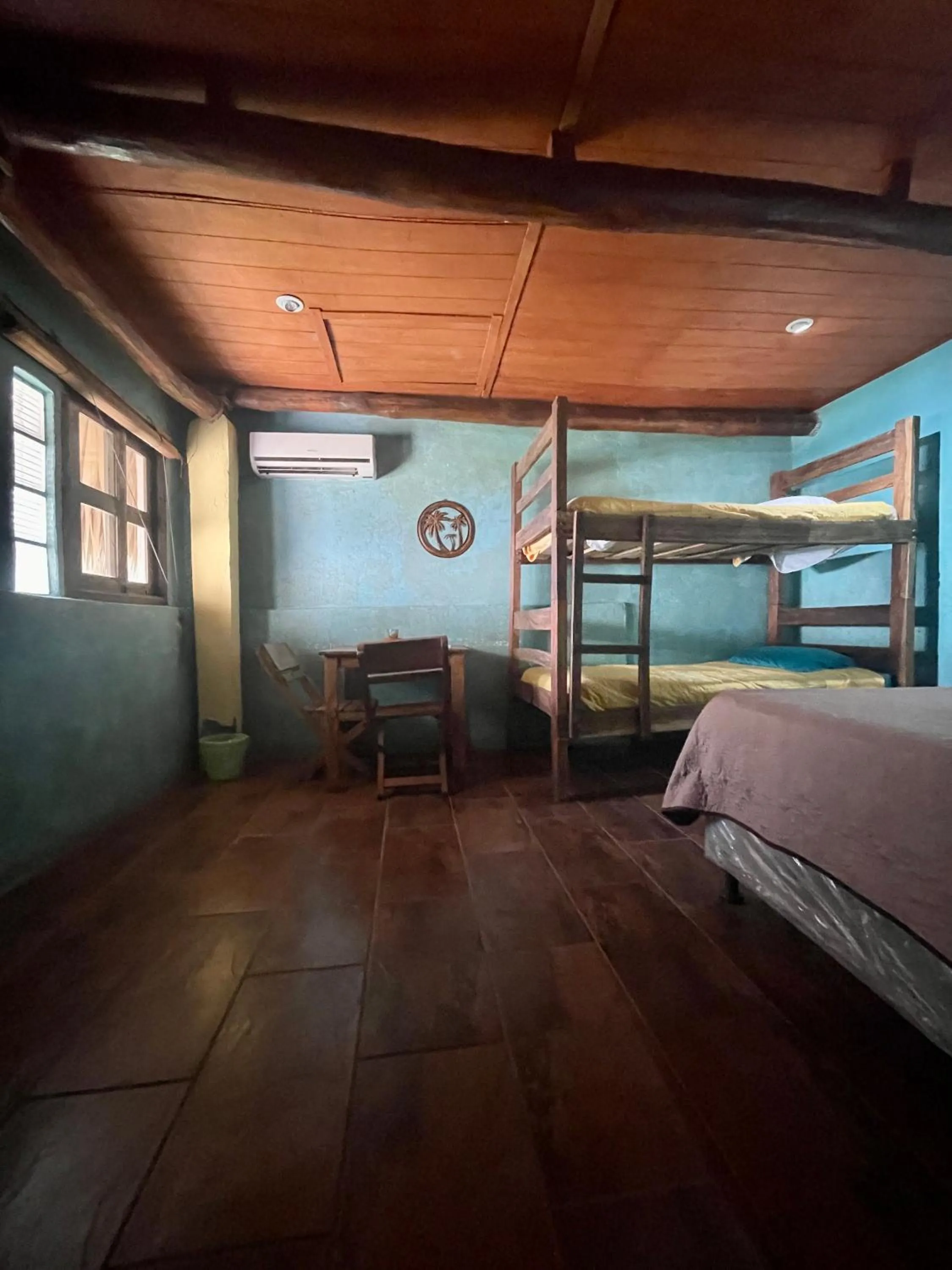 air conditioner, Bed in Johnnys Place Hotel