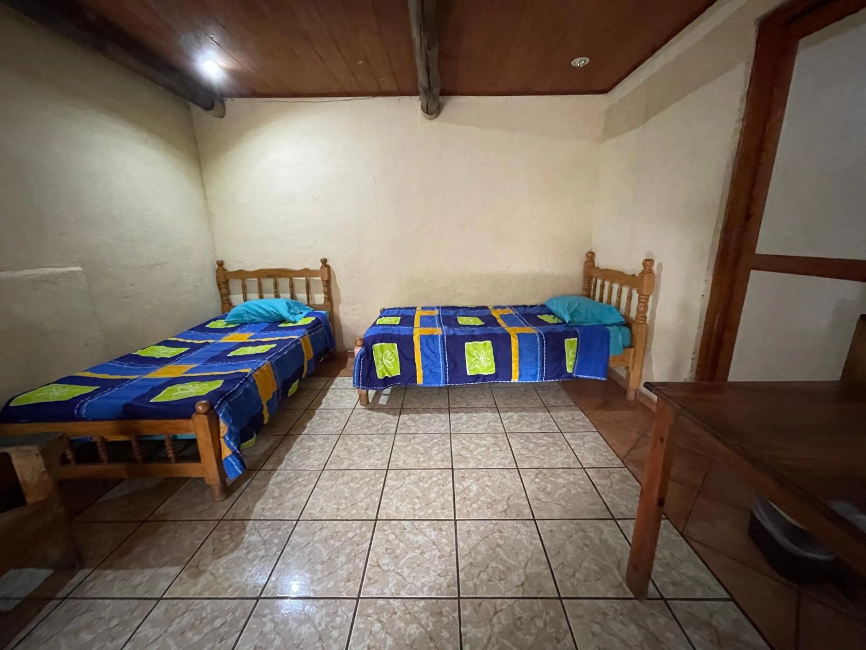 air conditioner, Bed in Johnnys Place Hotel