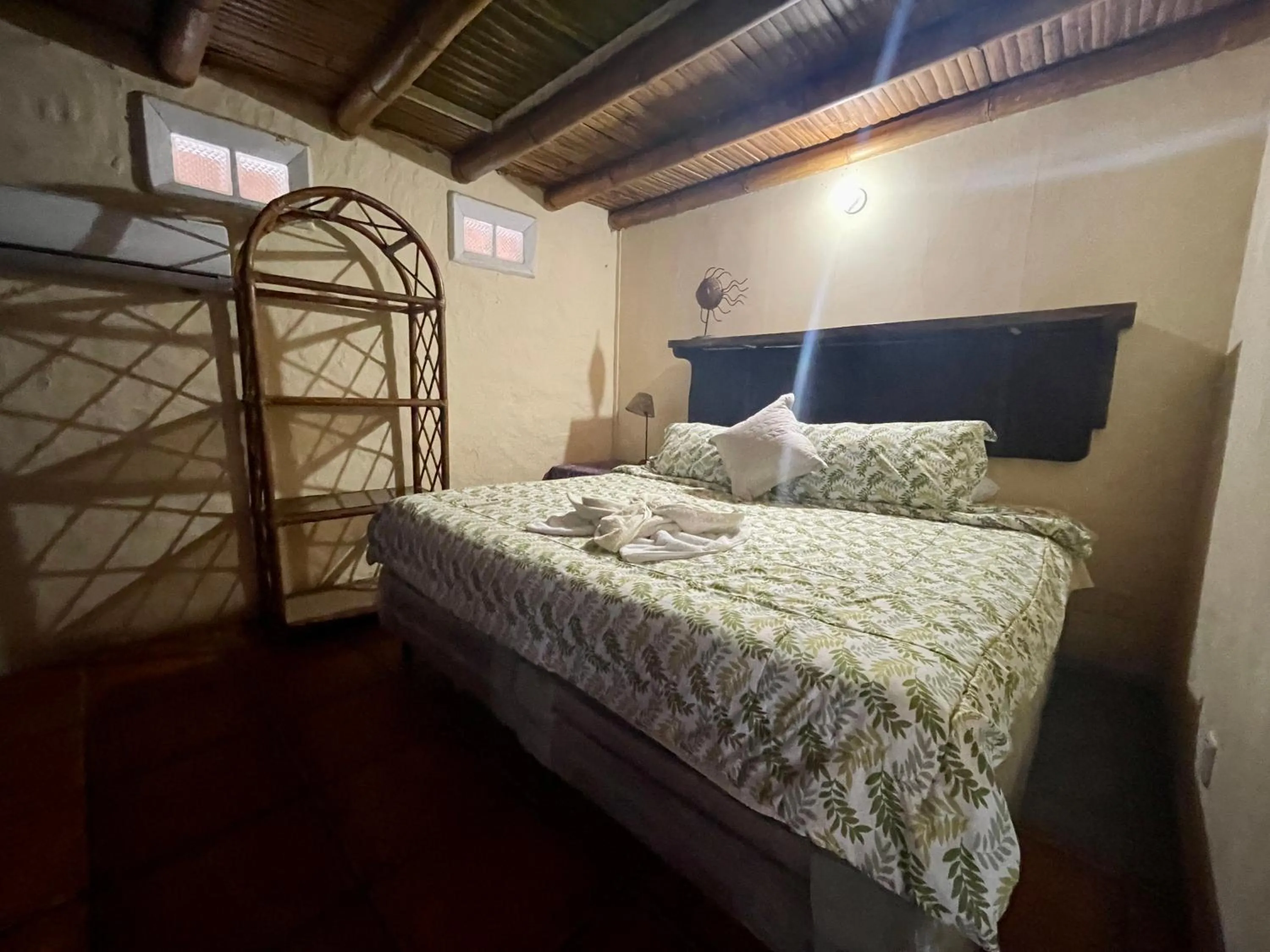 air conditioner, Bed in Johnnys Place Hotel