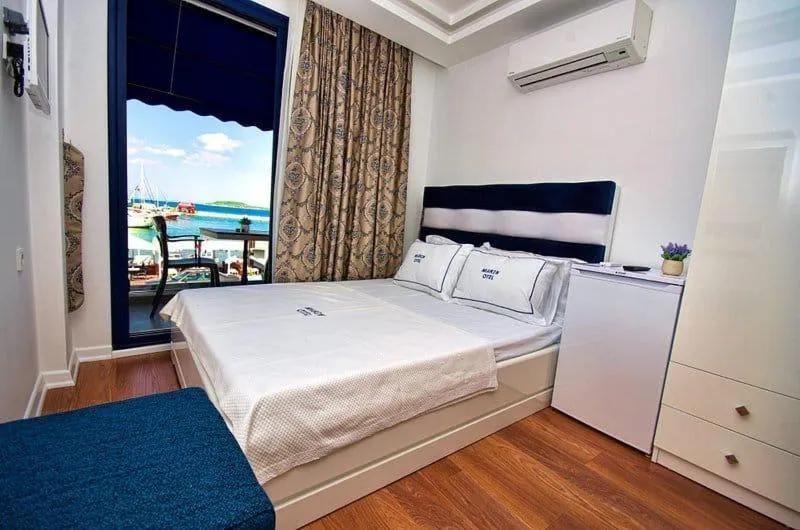 Photo of the whole room, Bed in Urla Marin otel