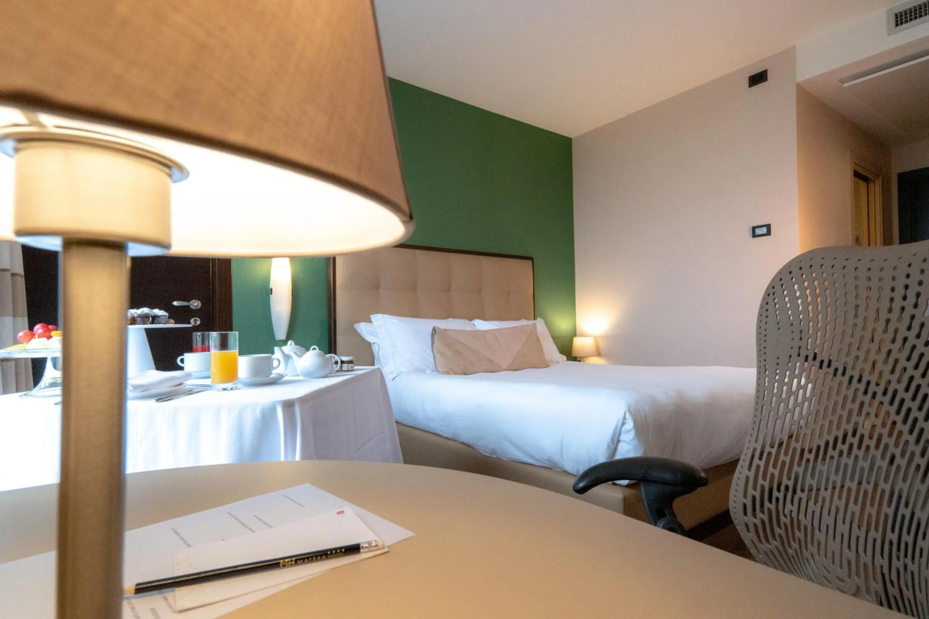 Bed in UNA HOTELS MH Matera