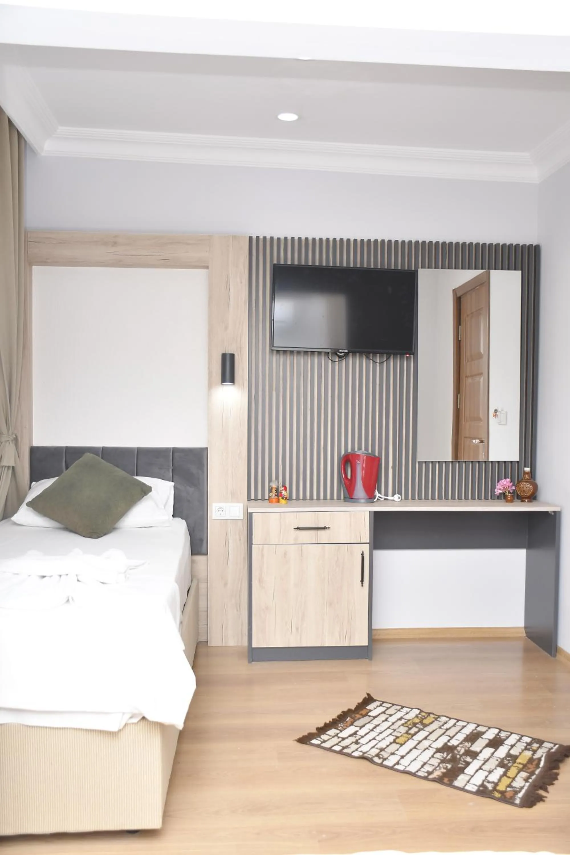 Kitchen or kitchenette, Bed in Hotel Arinna
