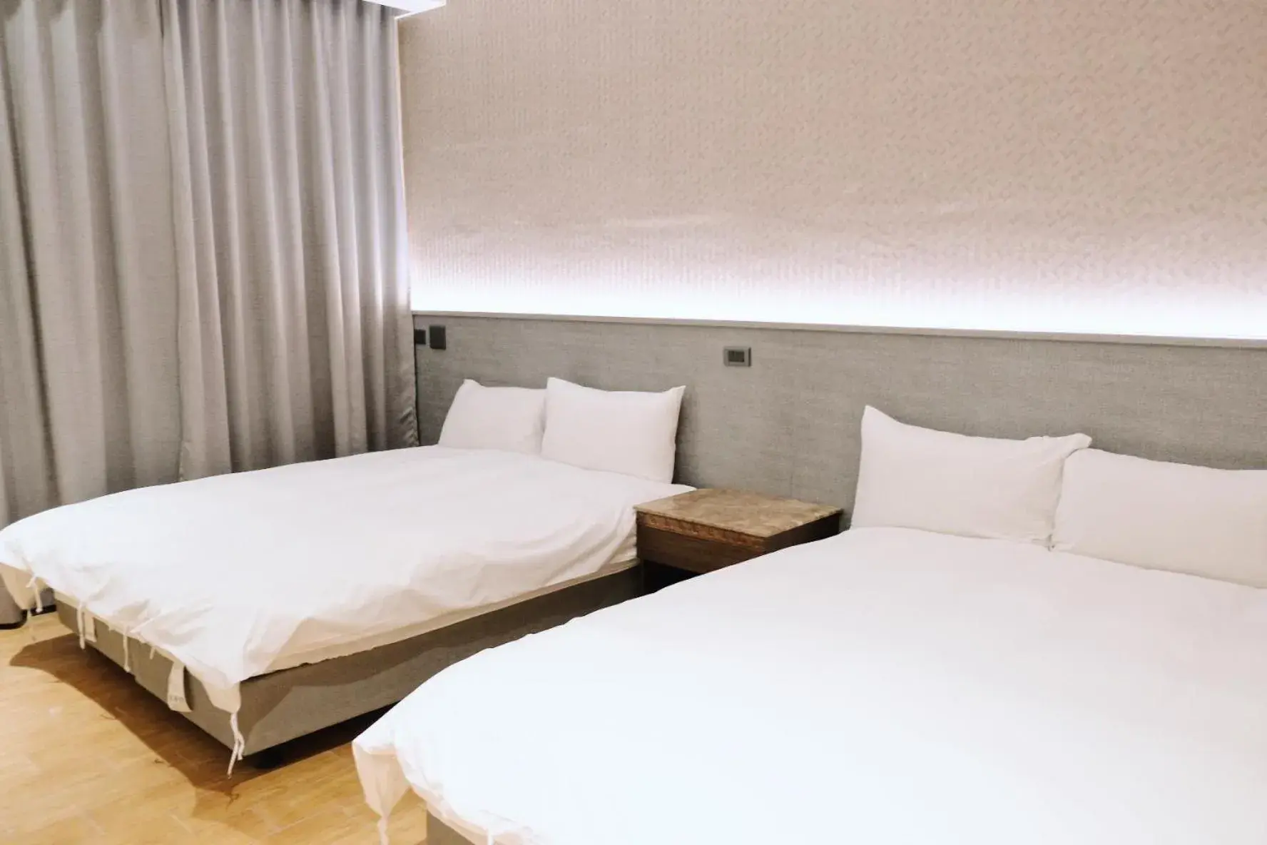 Quadruple Room in Hoping Mori Hotel Quadruple Room in Hoping Mori Hotel