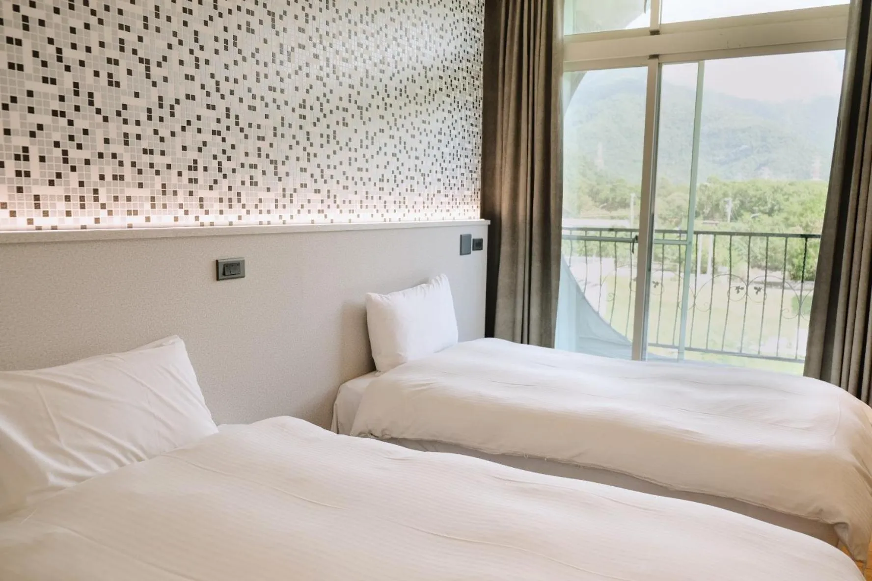 Bed in Hoping Mori Hotel